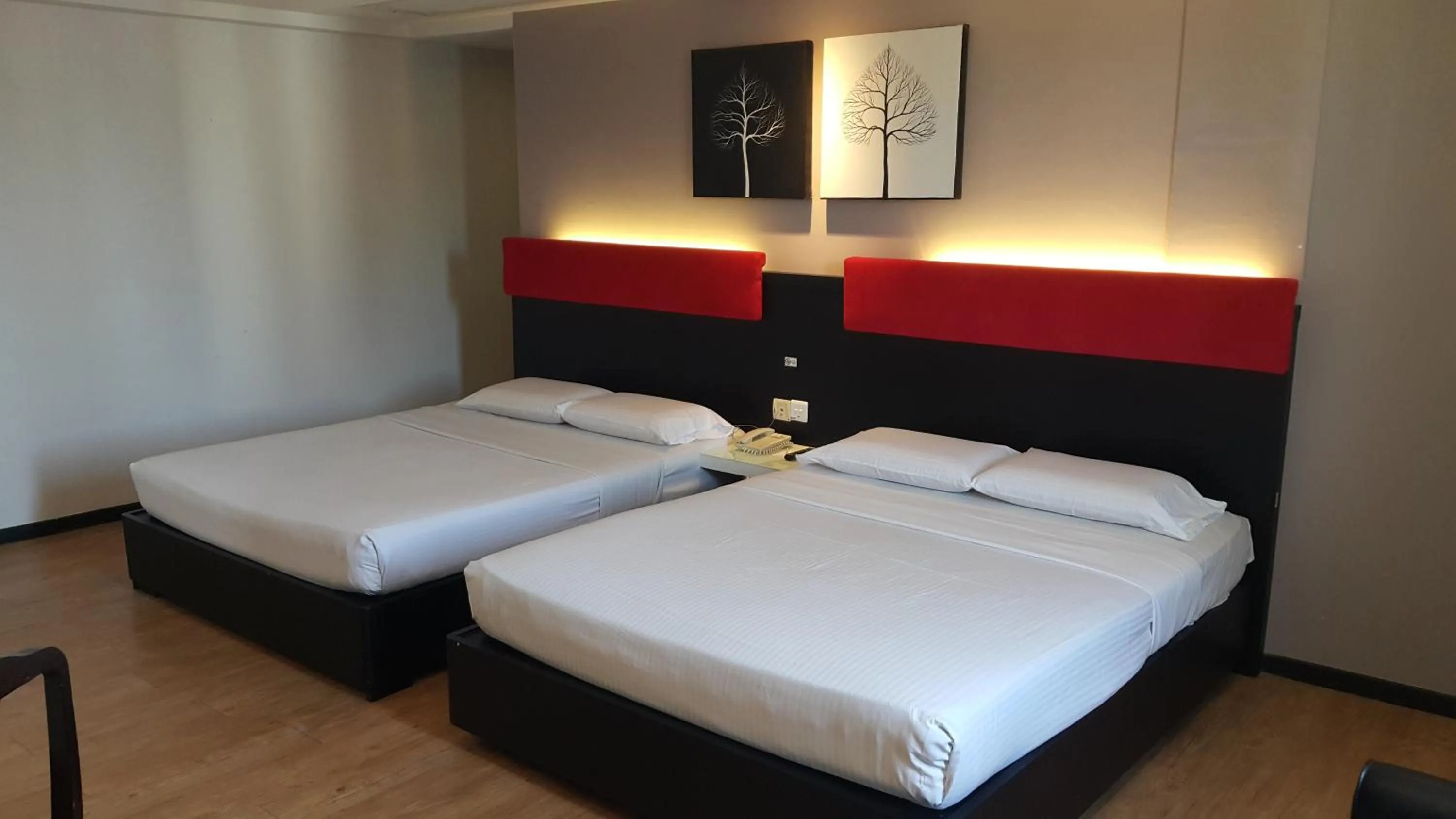 Bed in Red Rock Hotel Penang