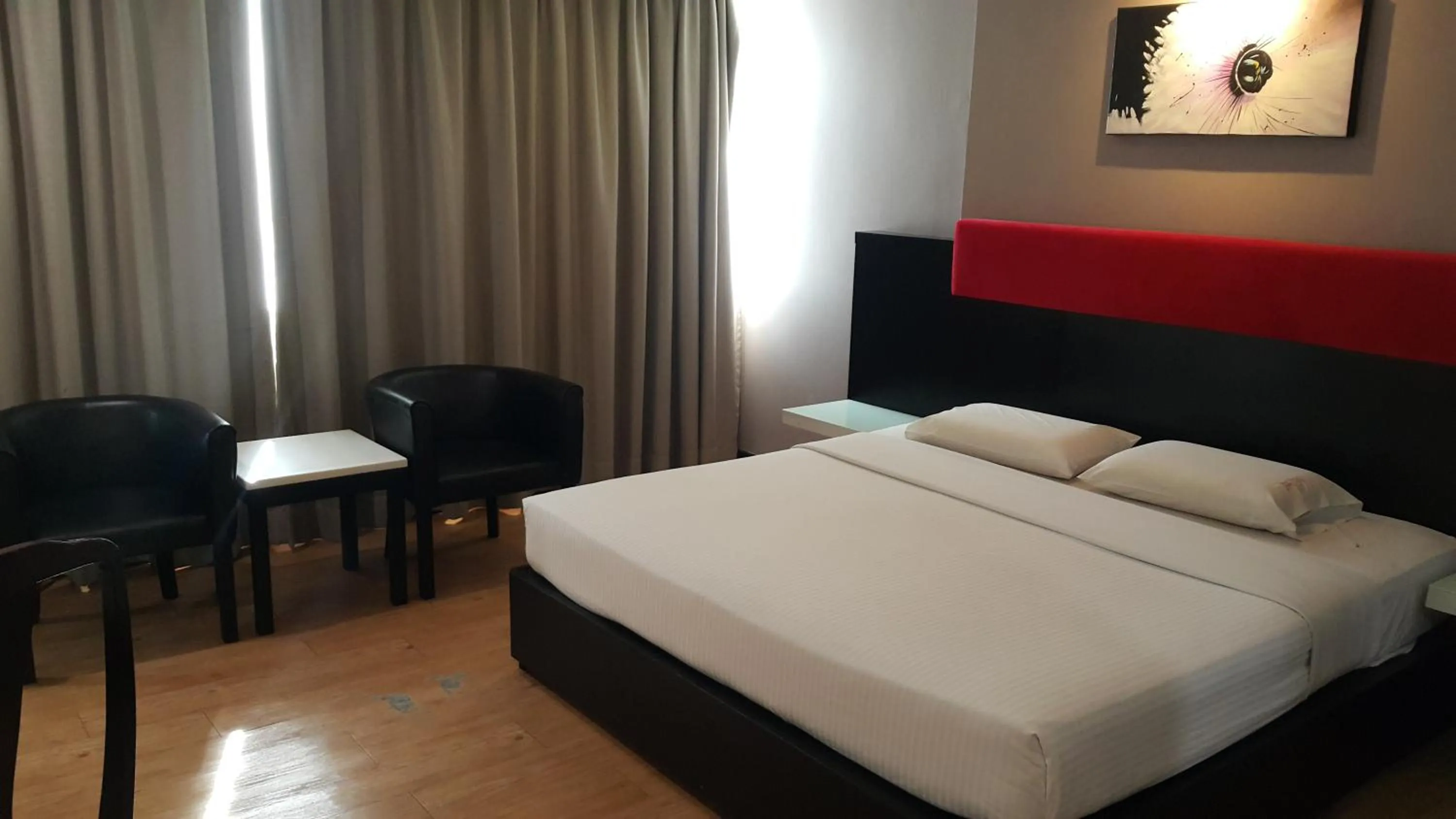 Bed in Red Rock Hotel Penang