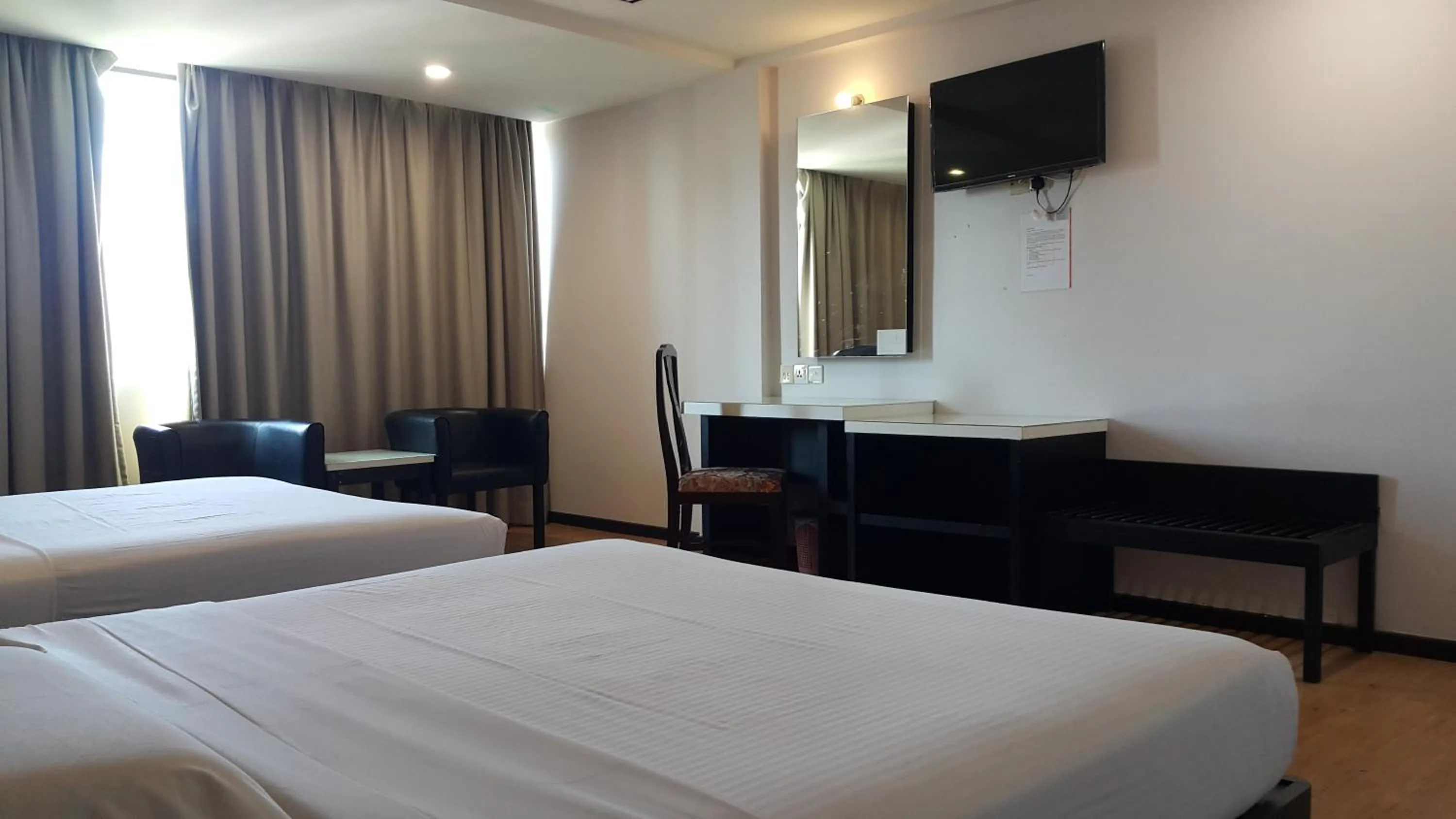 Bed in Red Rock Hotel Penang