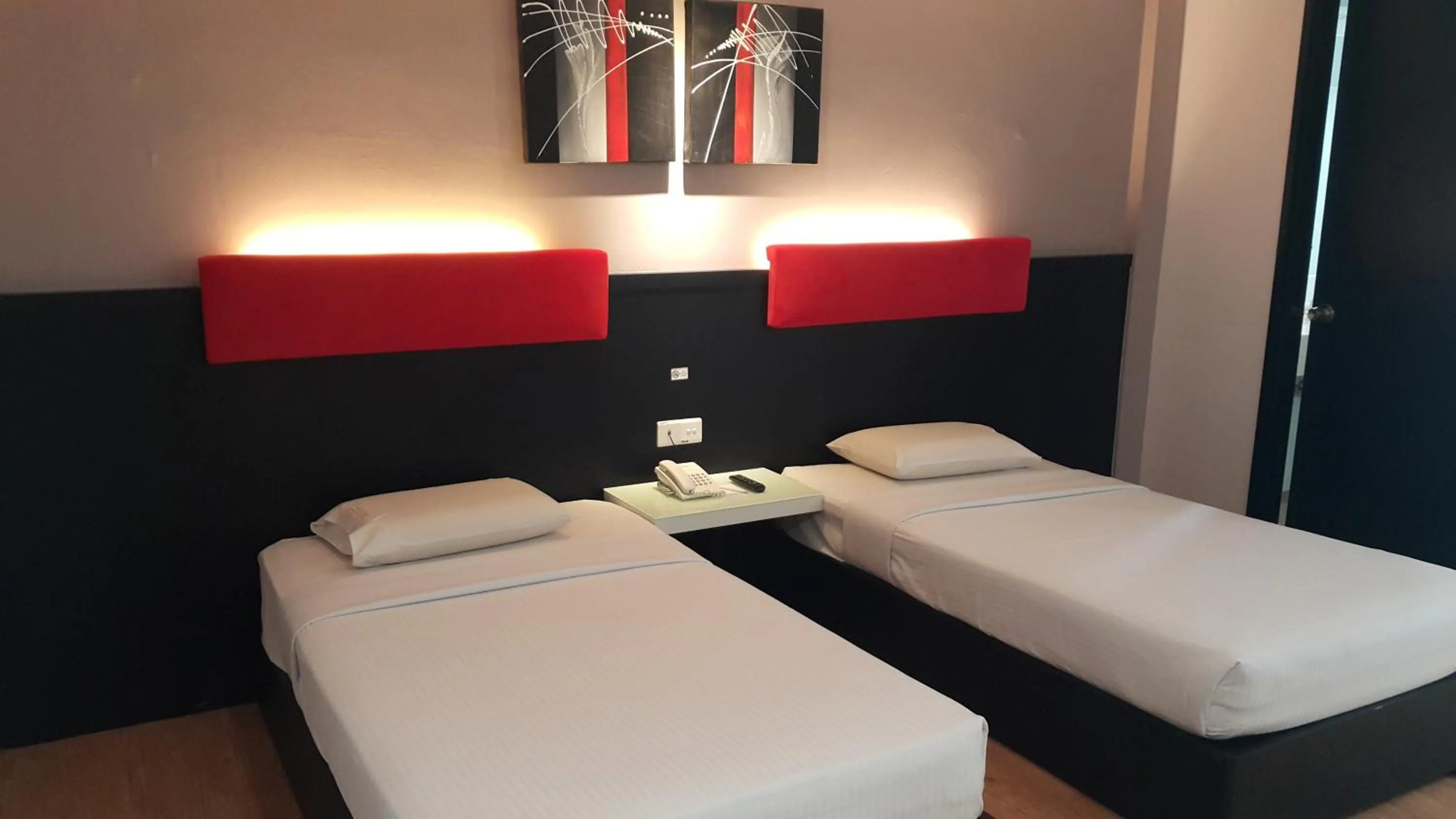 Bed in Red Rock Hotel Penang