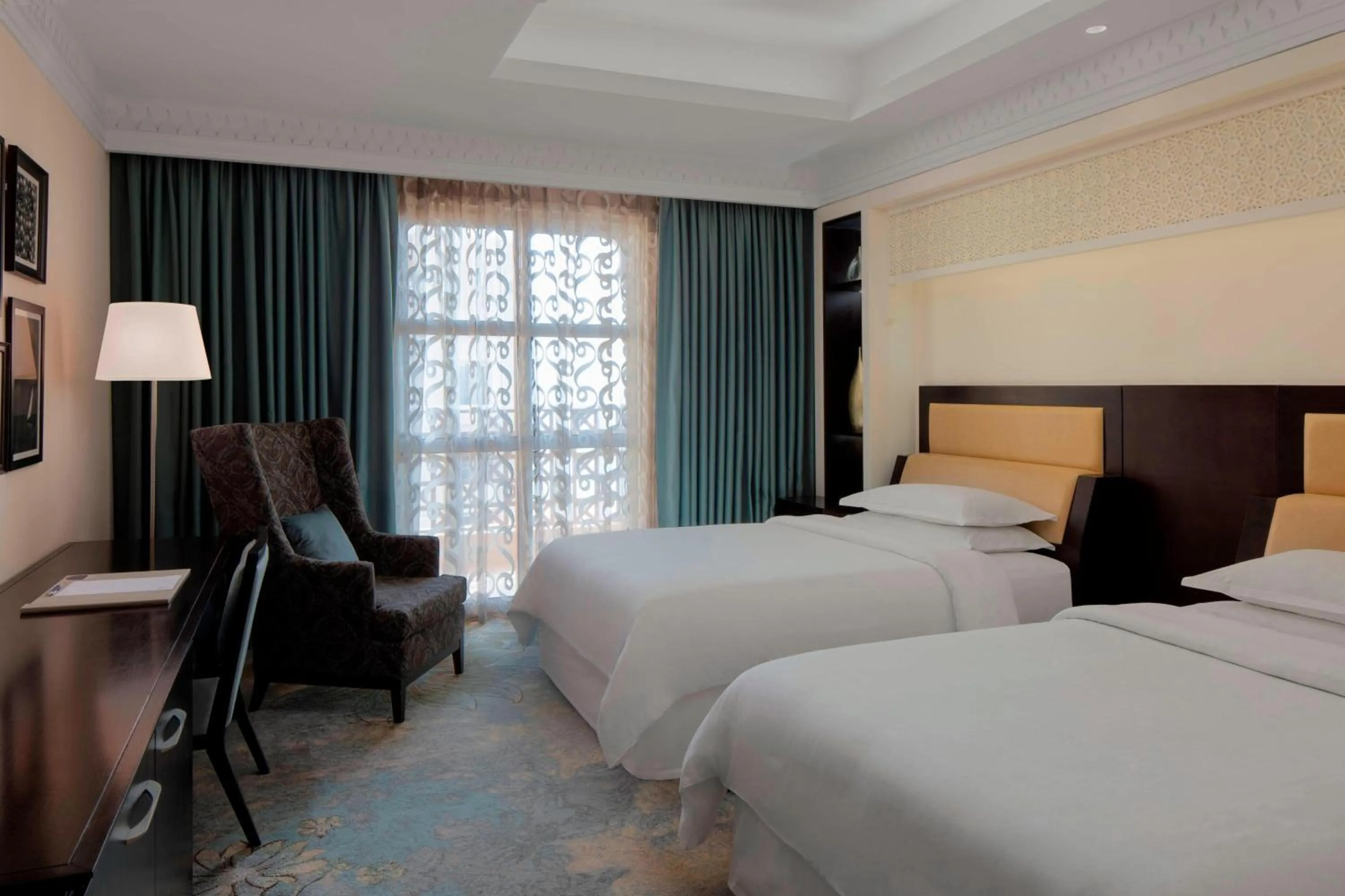 Photo of the whole room, Bed in Sheraton Sharjah Beach Resort and Spa