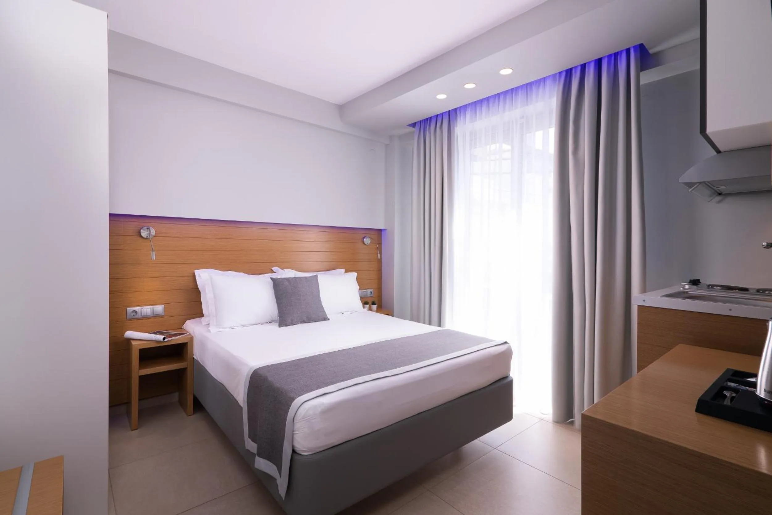 Bed in SKS Luxury Suites & Rooms