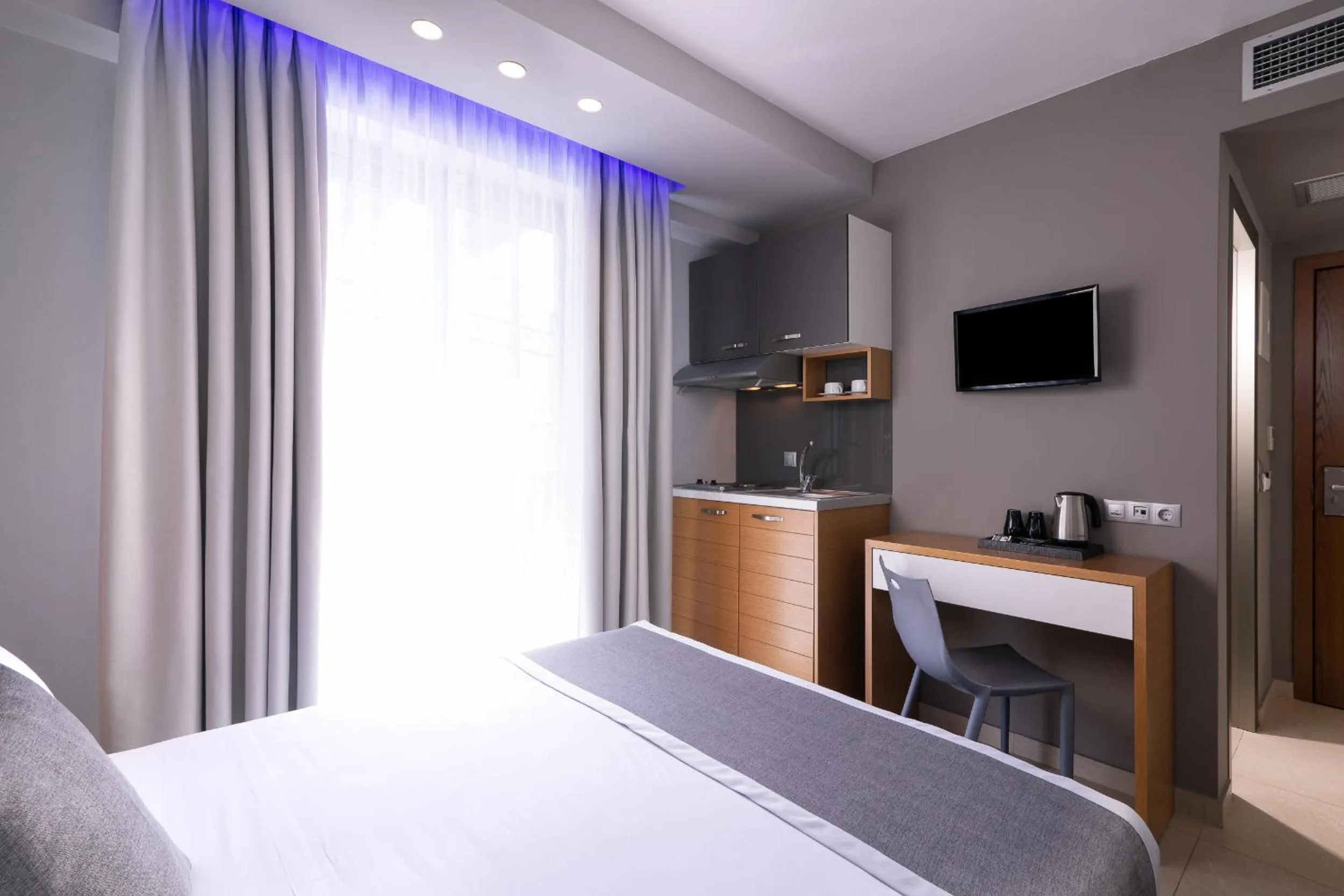 Bed in SKS Luxury Suites & Rooms