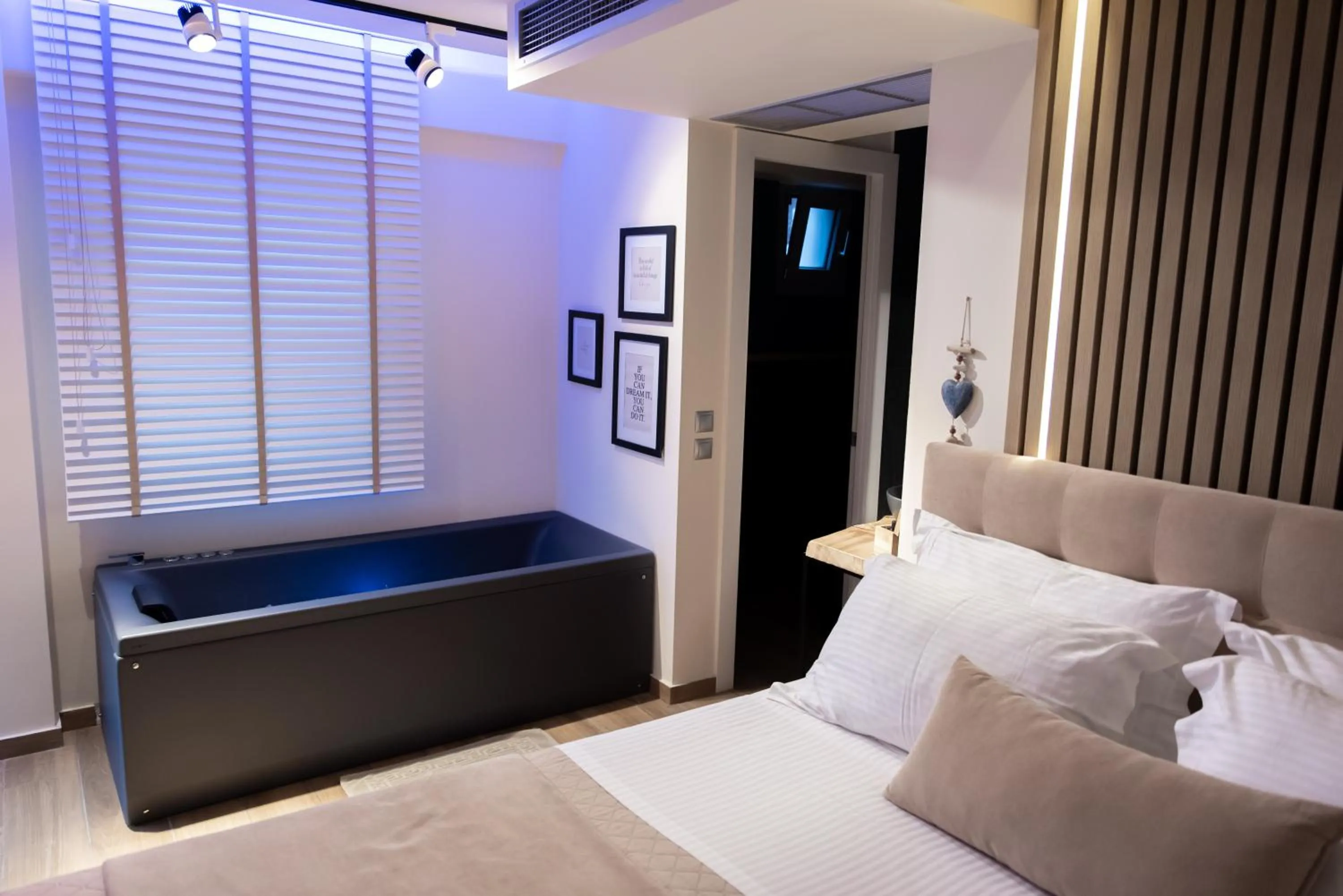 Bed in SKS Luxury Suites & Rooms