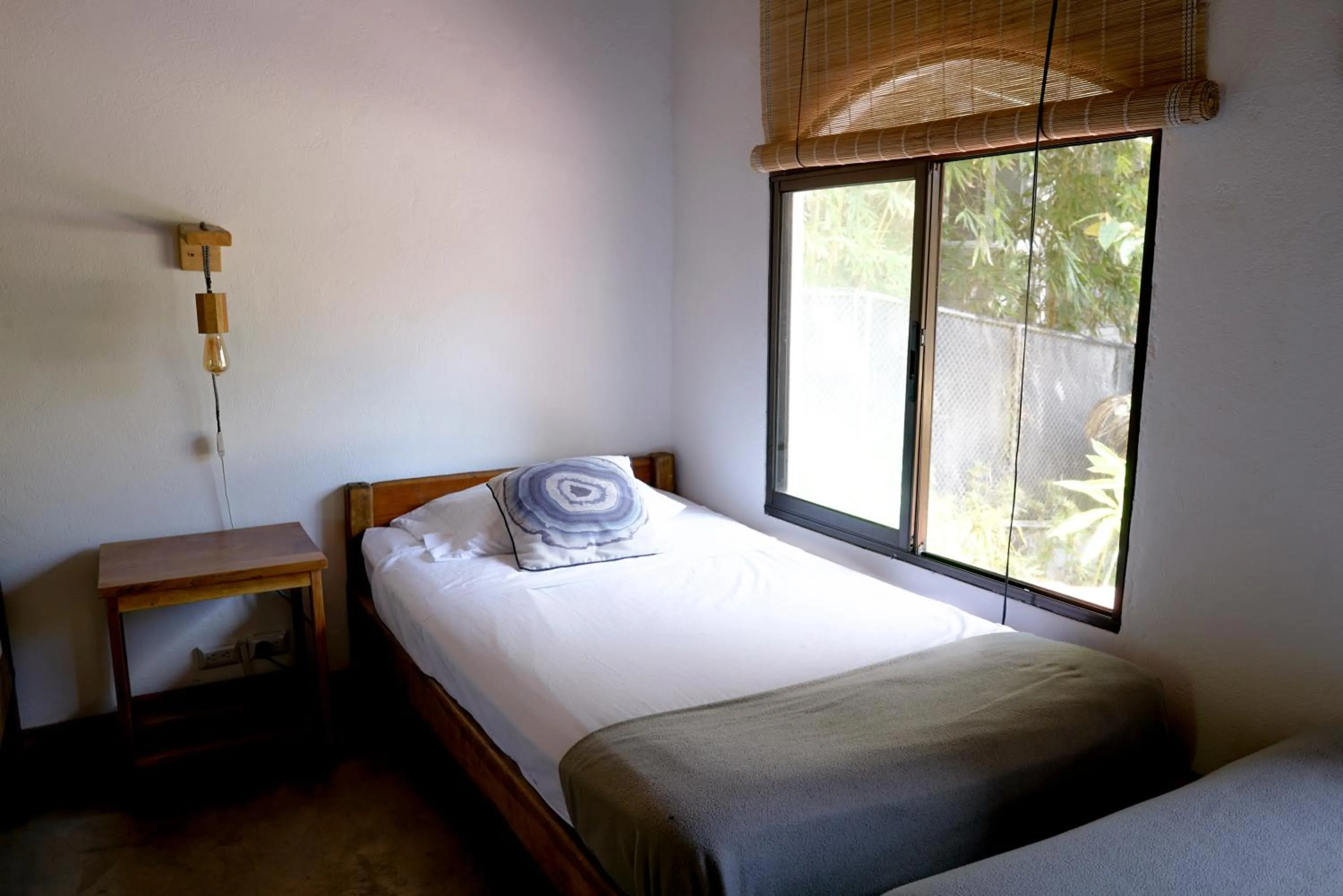 Bed in Believe Surf & Yoga Lodge Santa Teresa