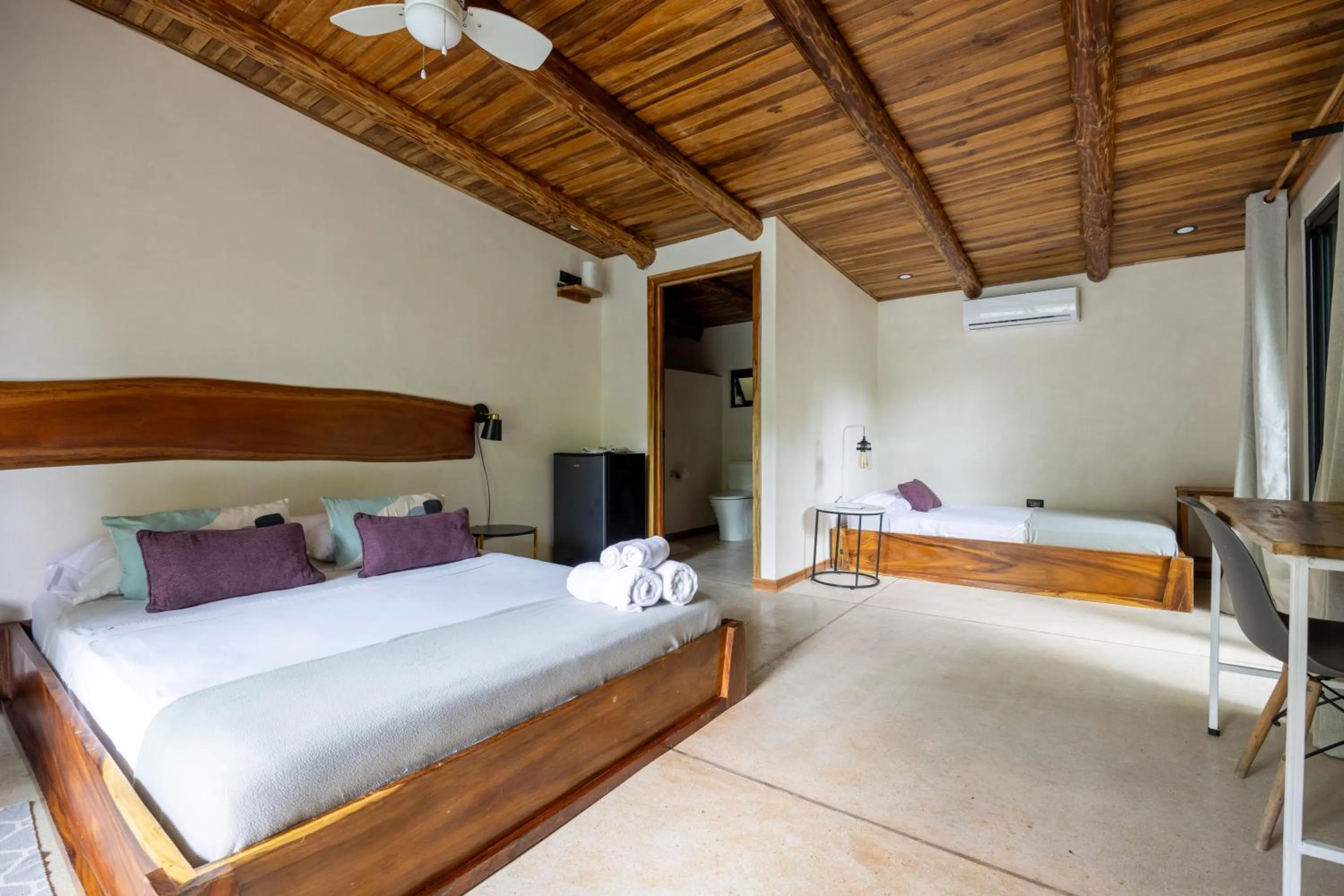 Photo of the whole room, Bed in Believe Surf & Yoga Lodge Santa Teresa