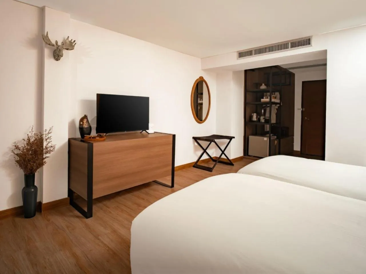 Bed in Issara Boutique Winery Hotel