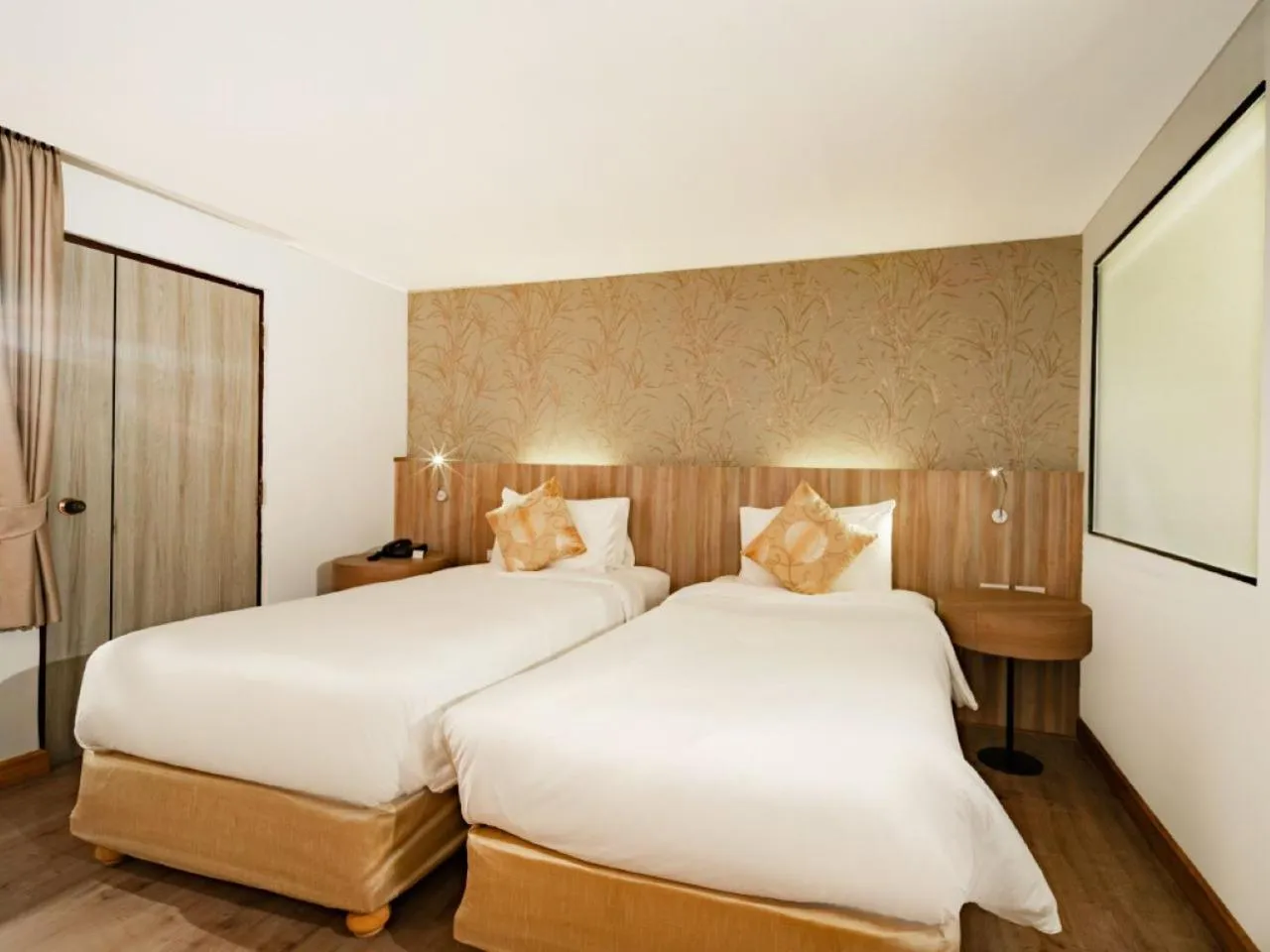 Bed in Issara Boutique Winery Hotel