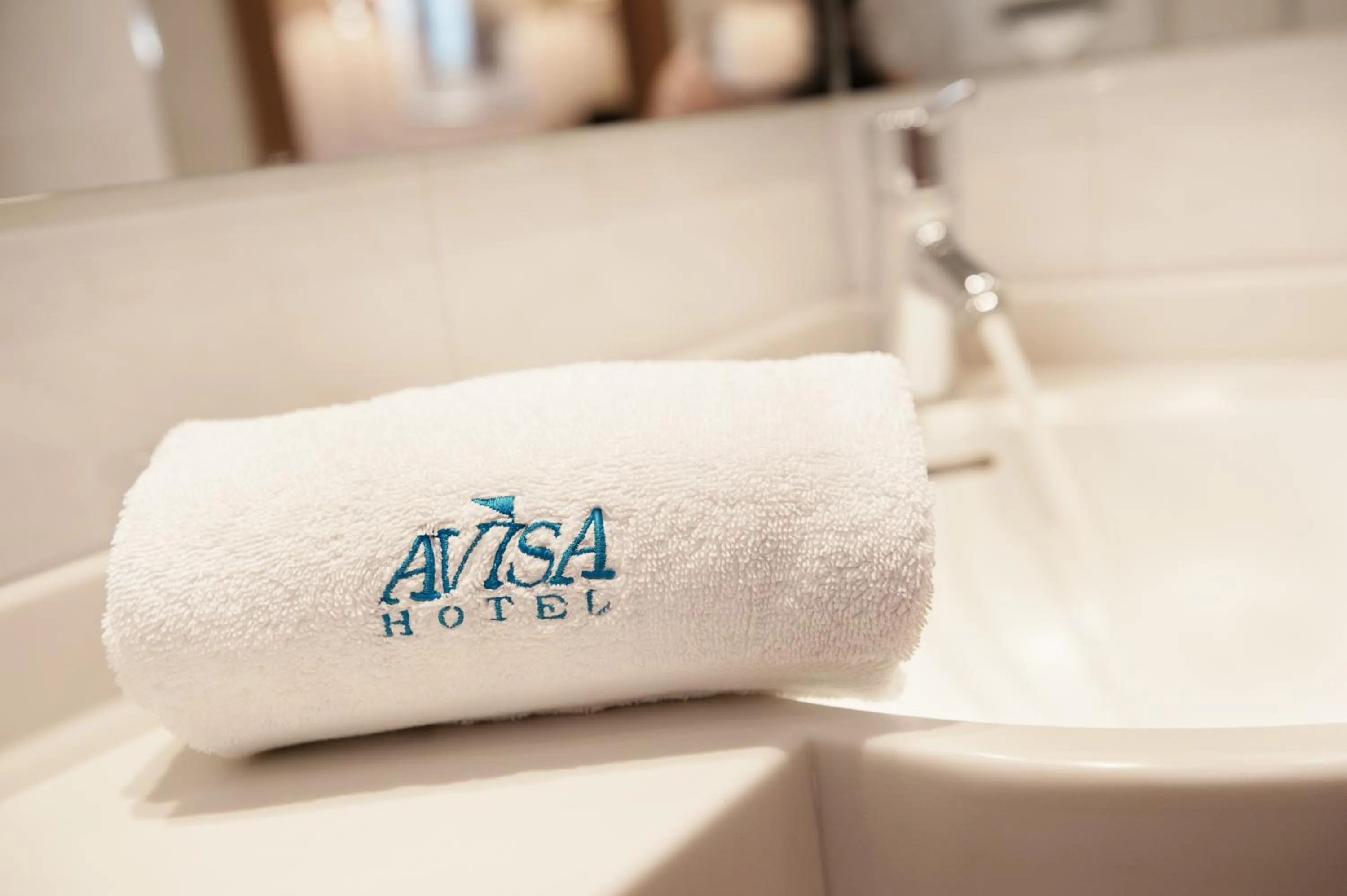 Property logo or sign in Hotel Avisa