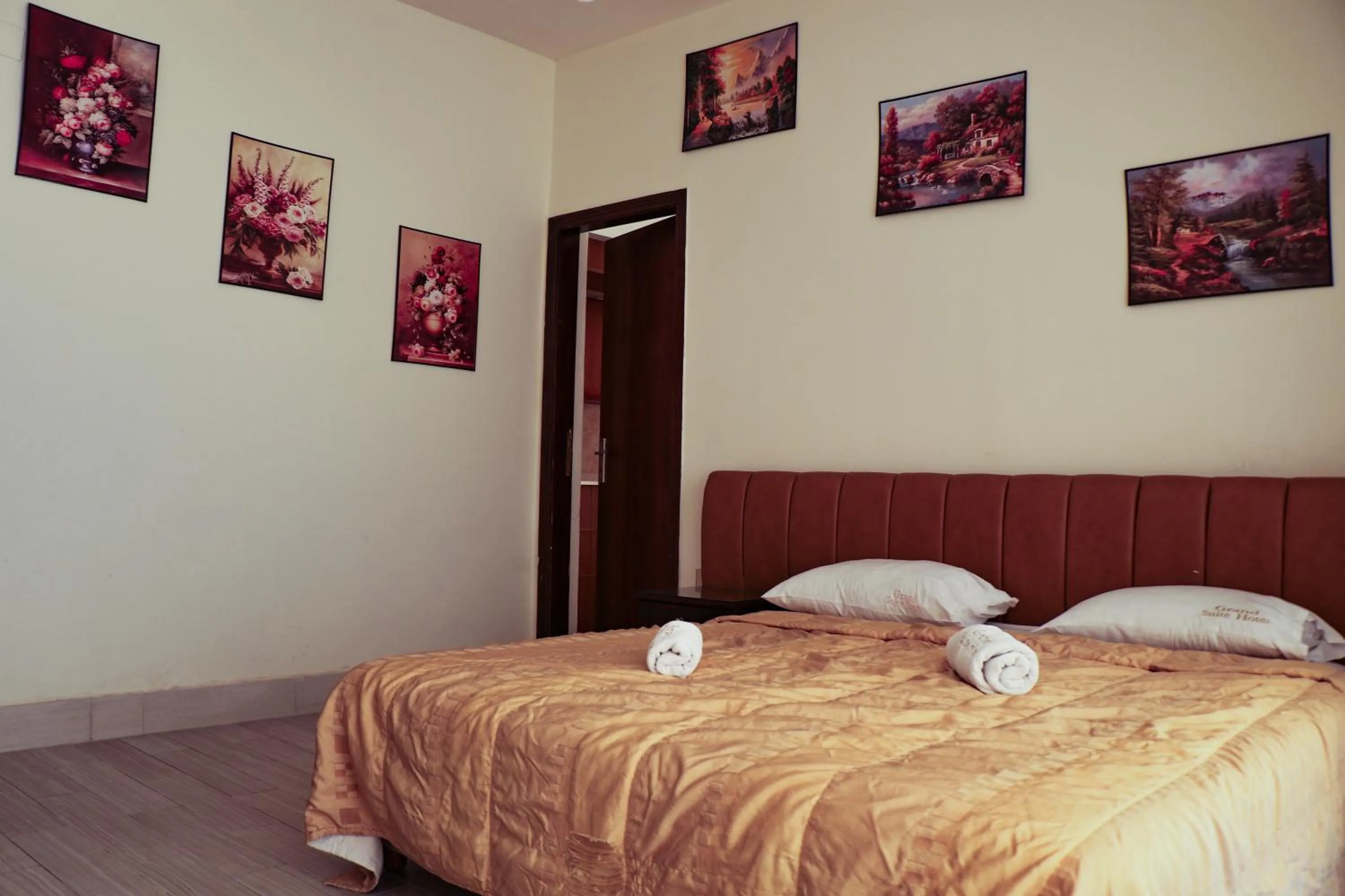 Bed in Grand Suites Hotel