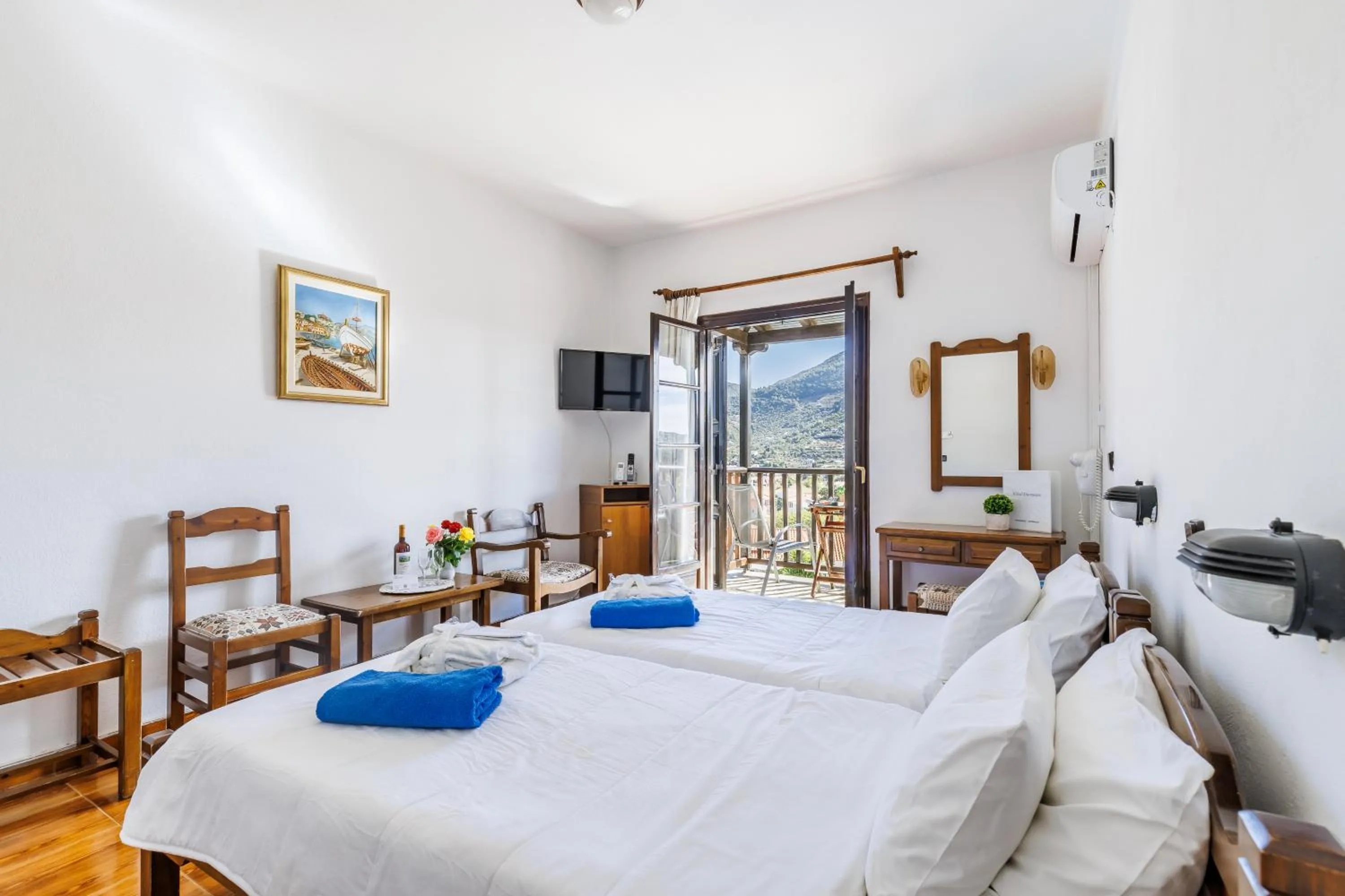 Bed in Hotel Dionyssos