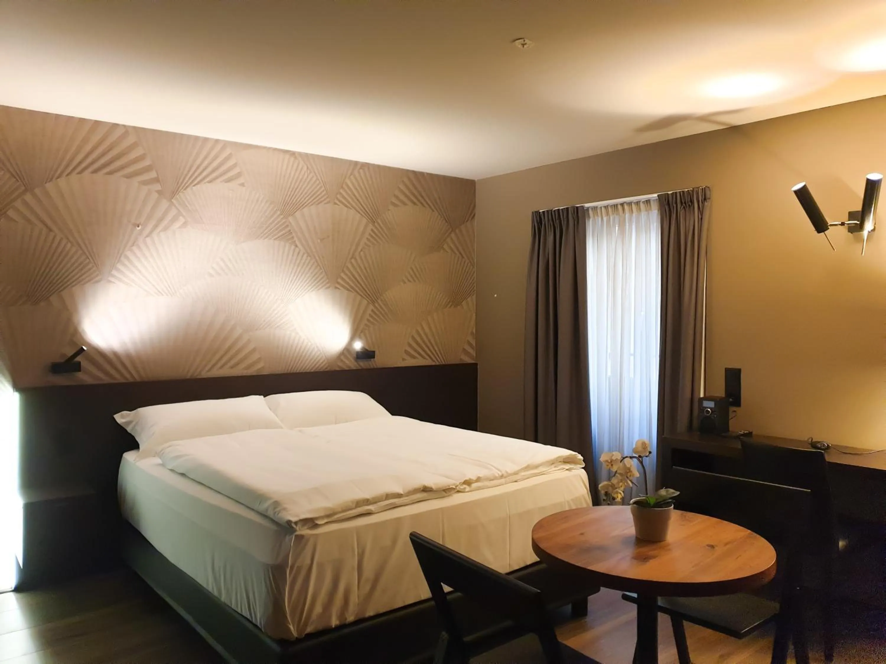 Bed in San Carlo Suite