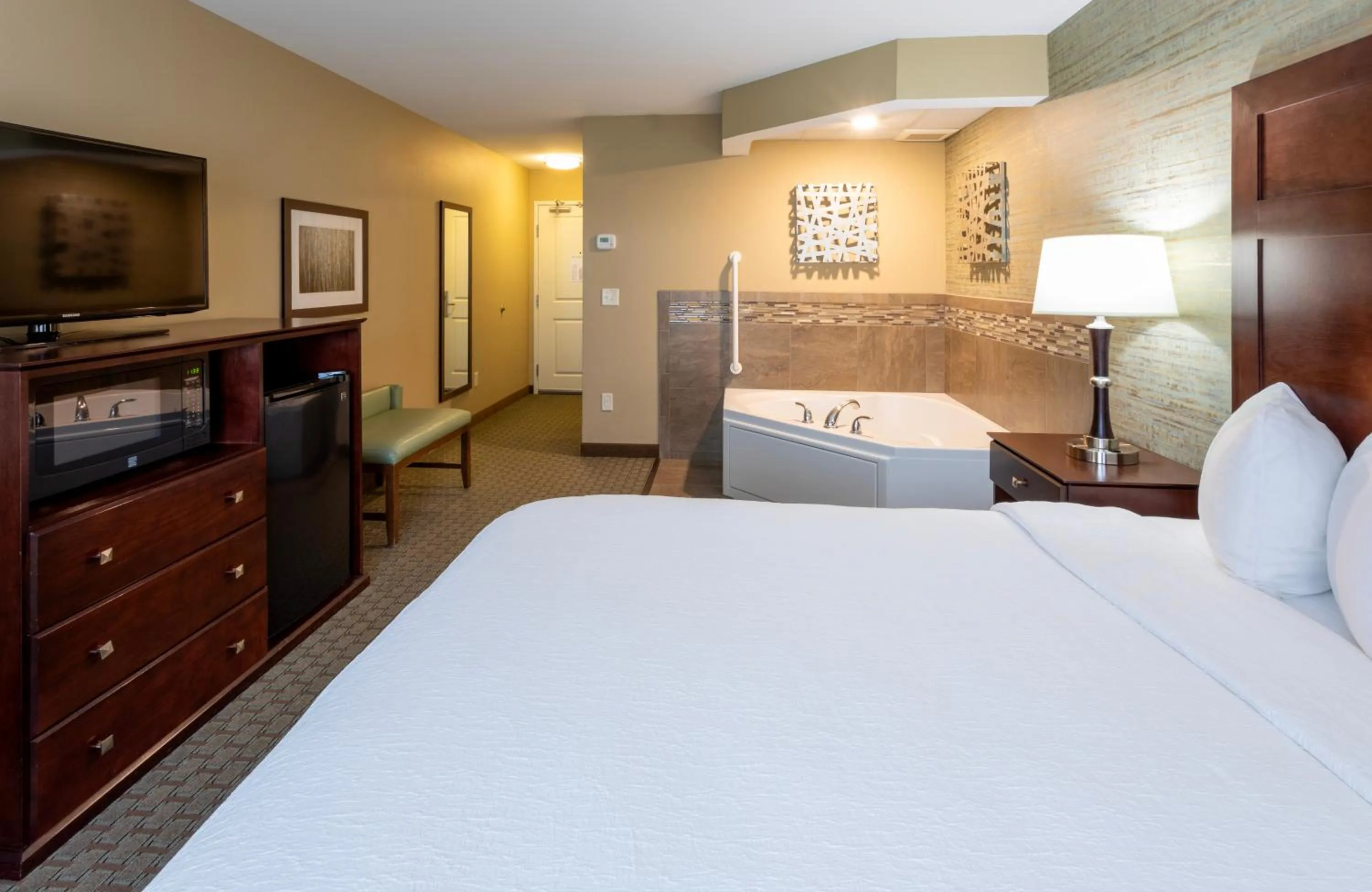 Photo of the whole room, Bed in GrandStay Hotel & Suites - Morris