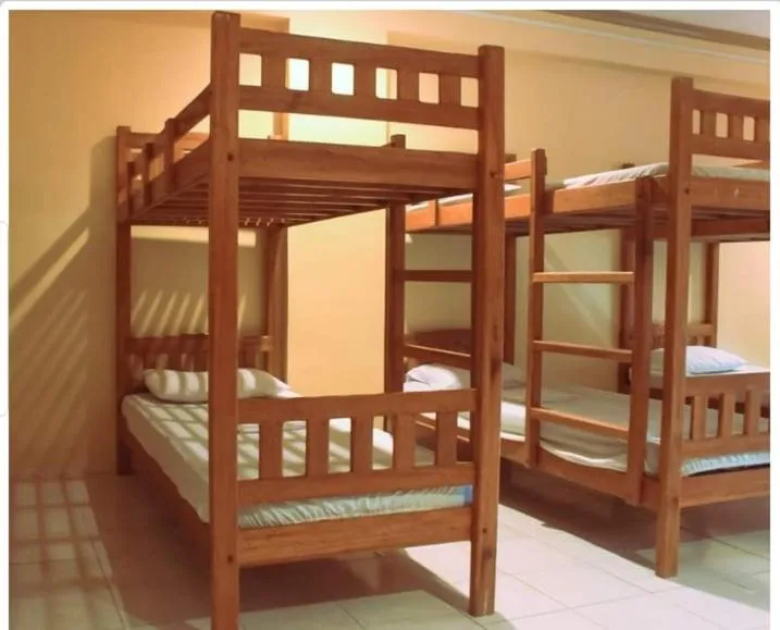 Property building, Bed in The Waterfront Beach Resort