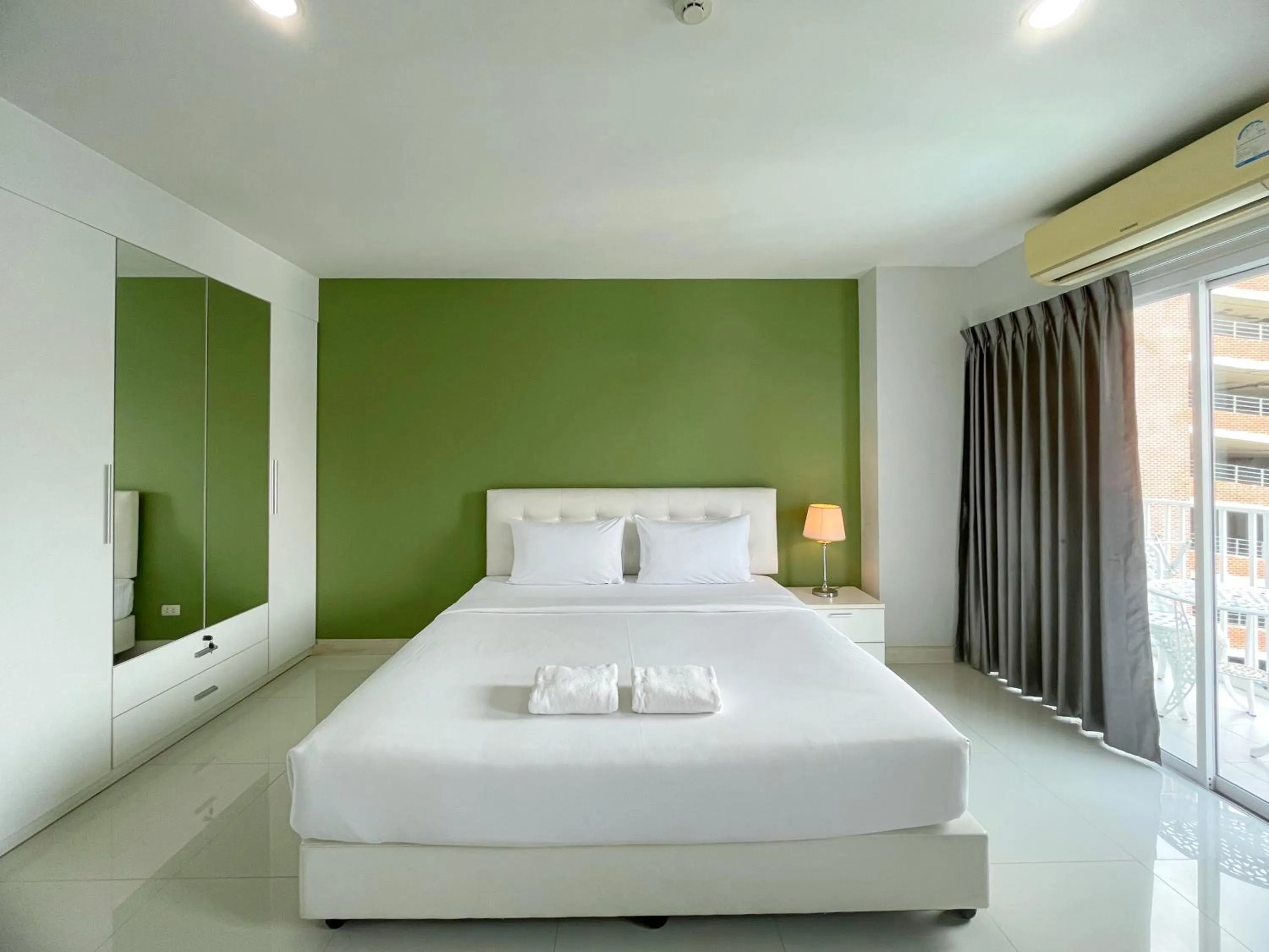 Bed in Baan Pattaya by Sabai