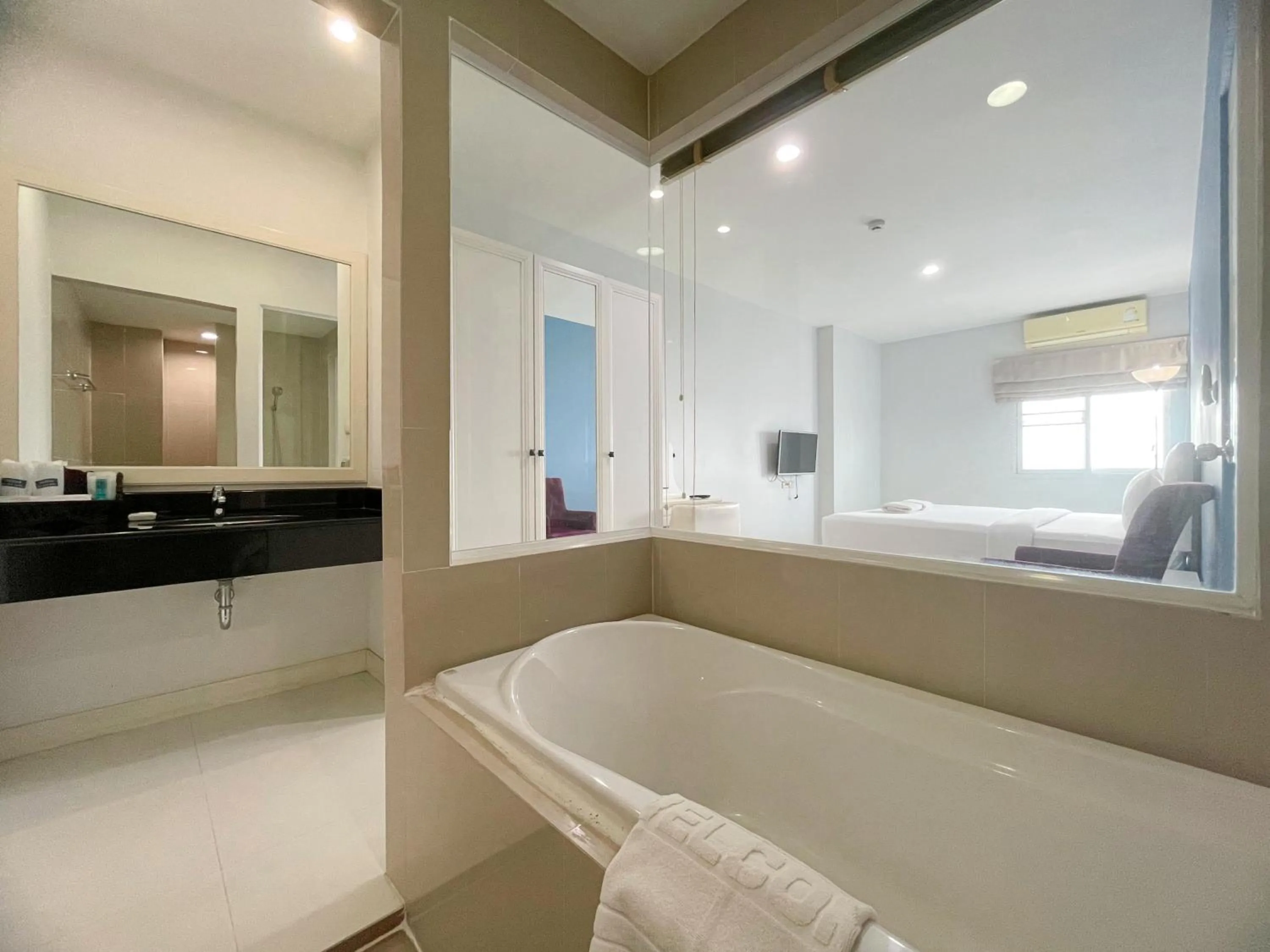 Bathroom, Bed in Baan Pattaya by Sabai