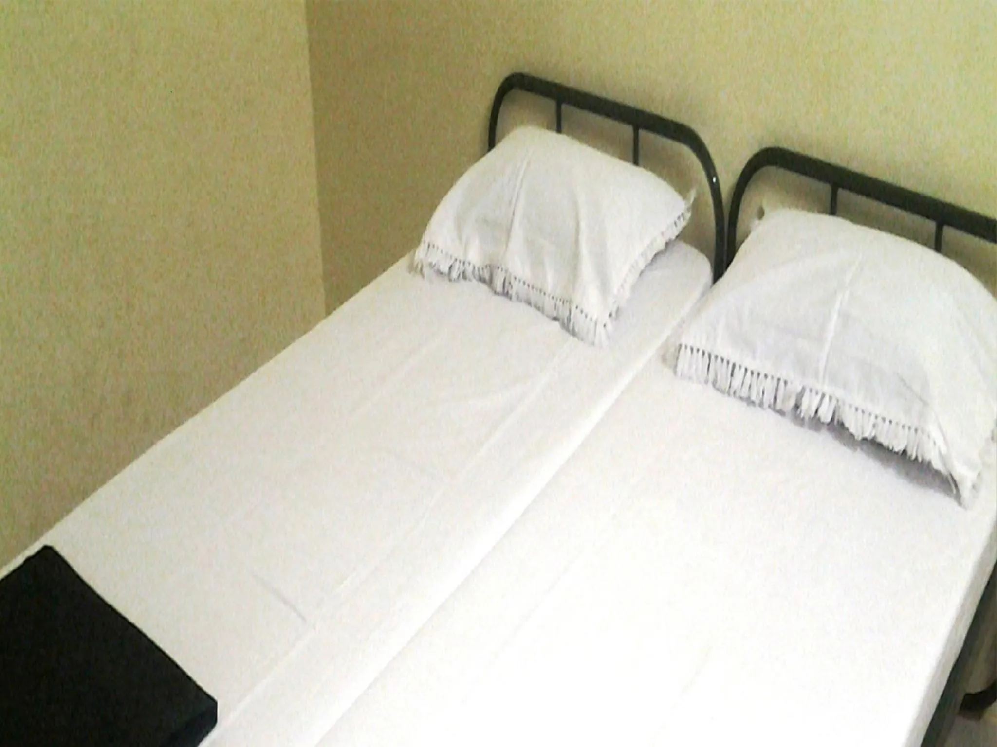 Bed in BSSK Comforts Inn