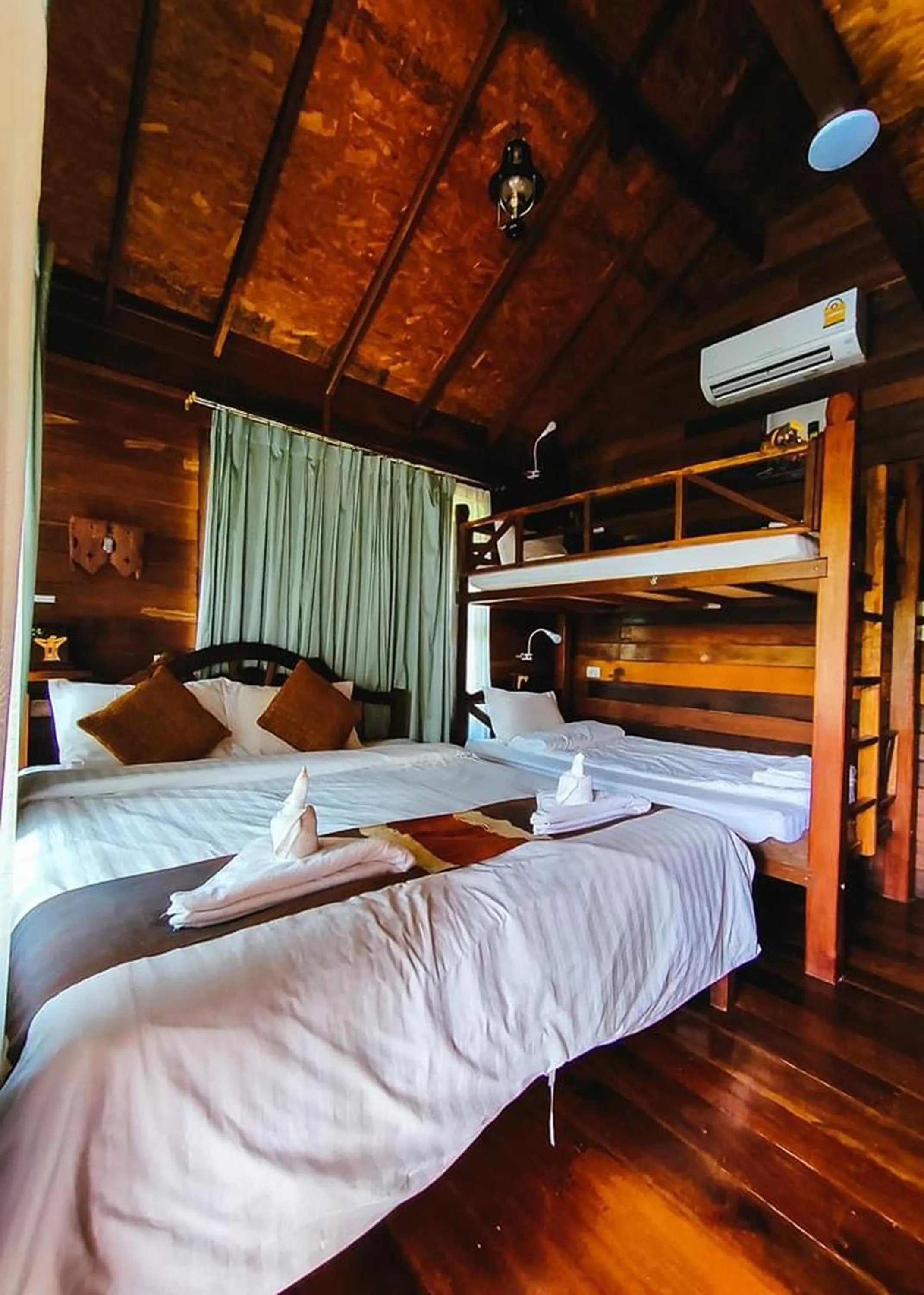 Bed in Boutique Village Hotel