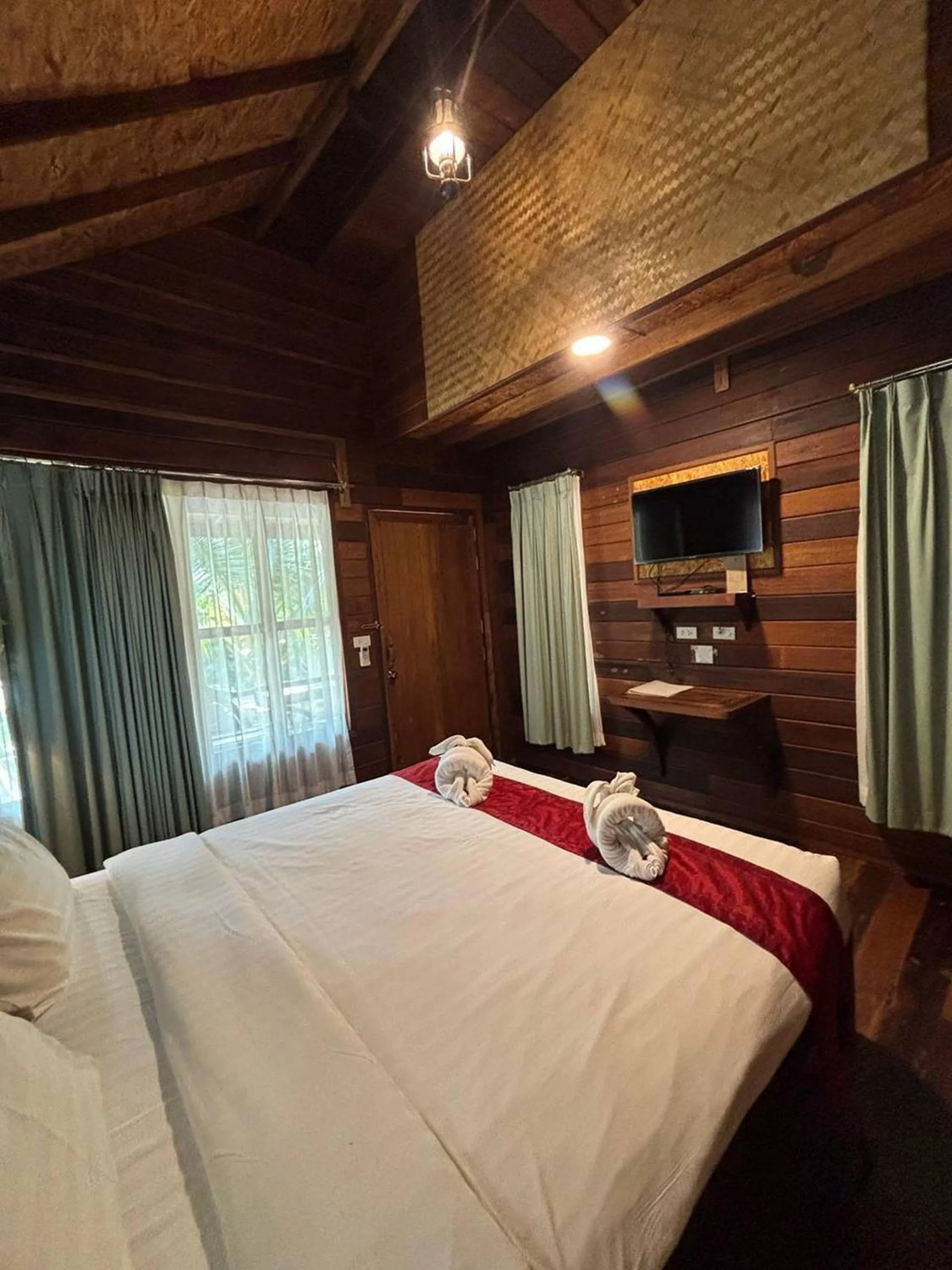 Bed in Boutique Village Hotel