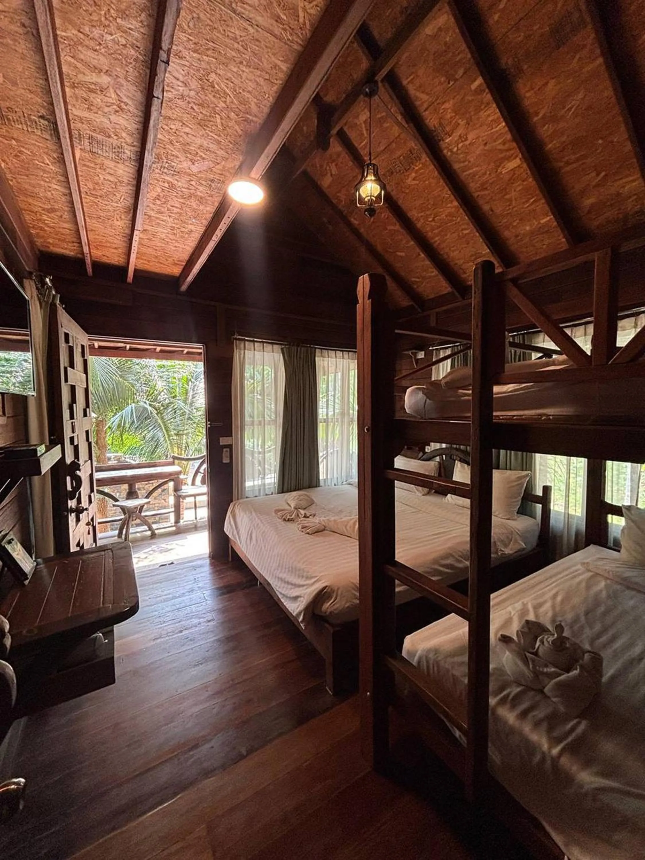 Bed in Boutique Village Hotel