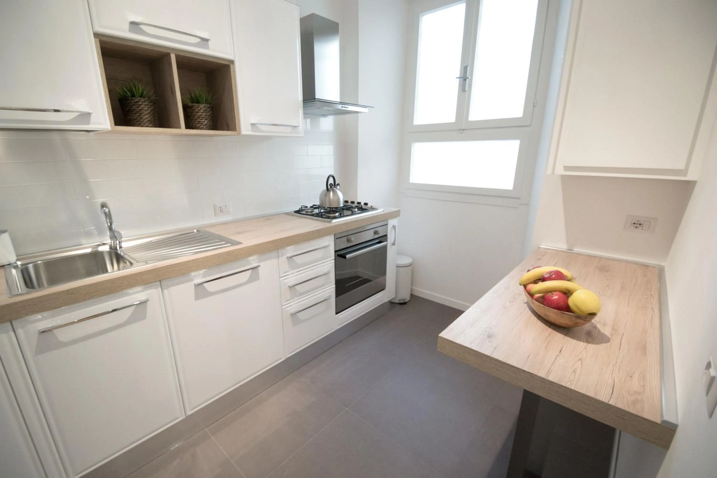 Communal kitchen in Vantaggio Apartment