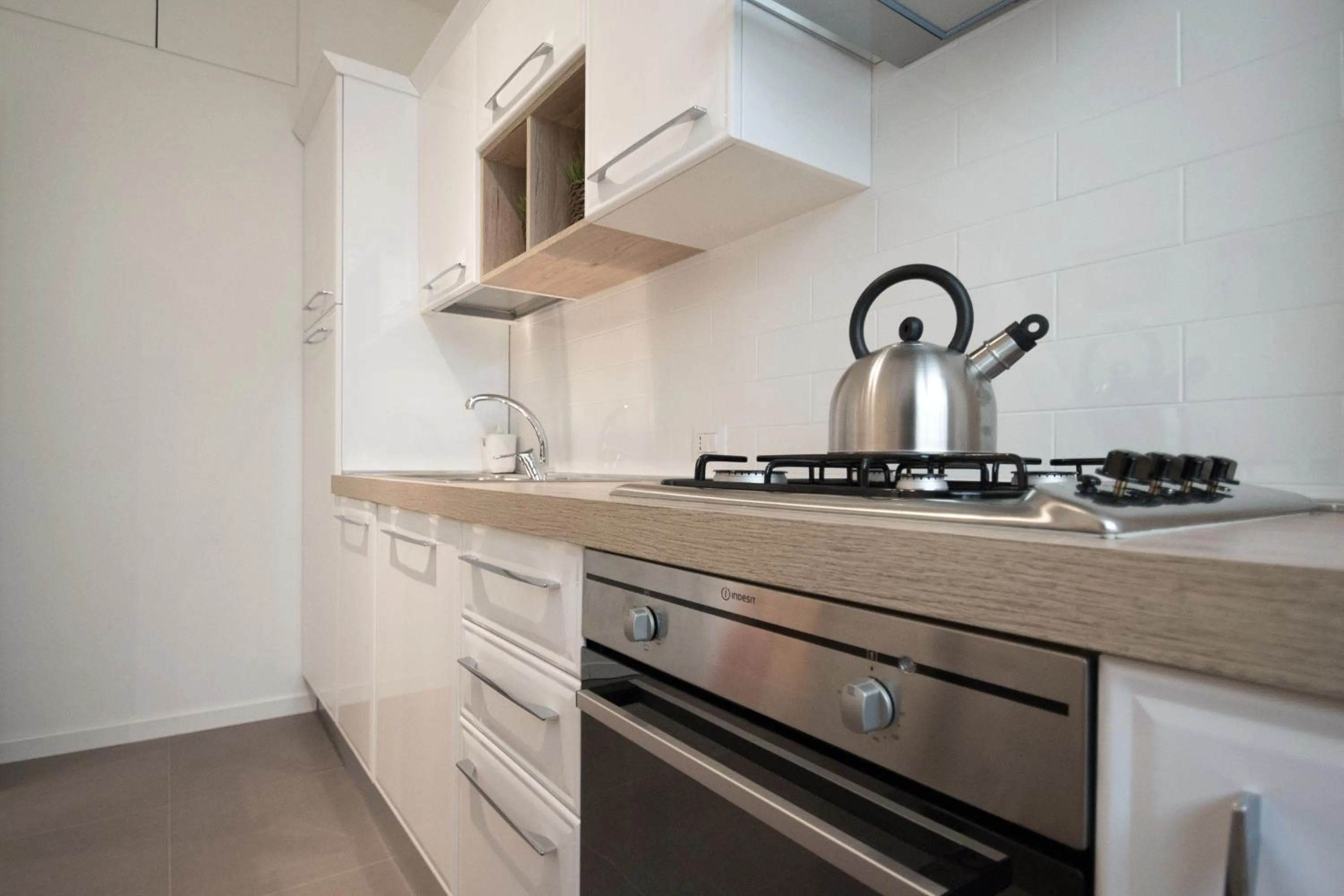 Communal kitchen in Vantaggio Apartment