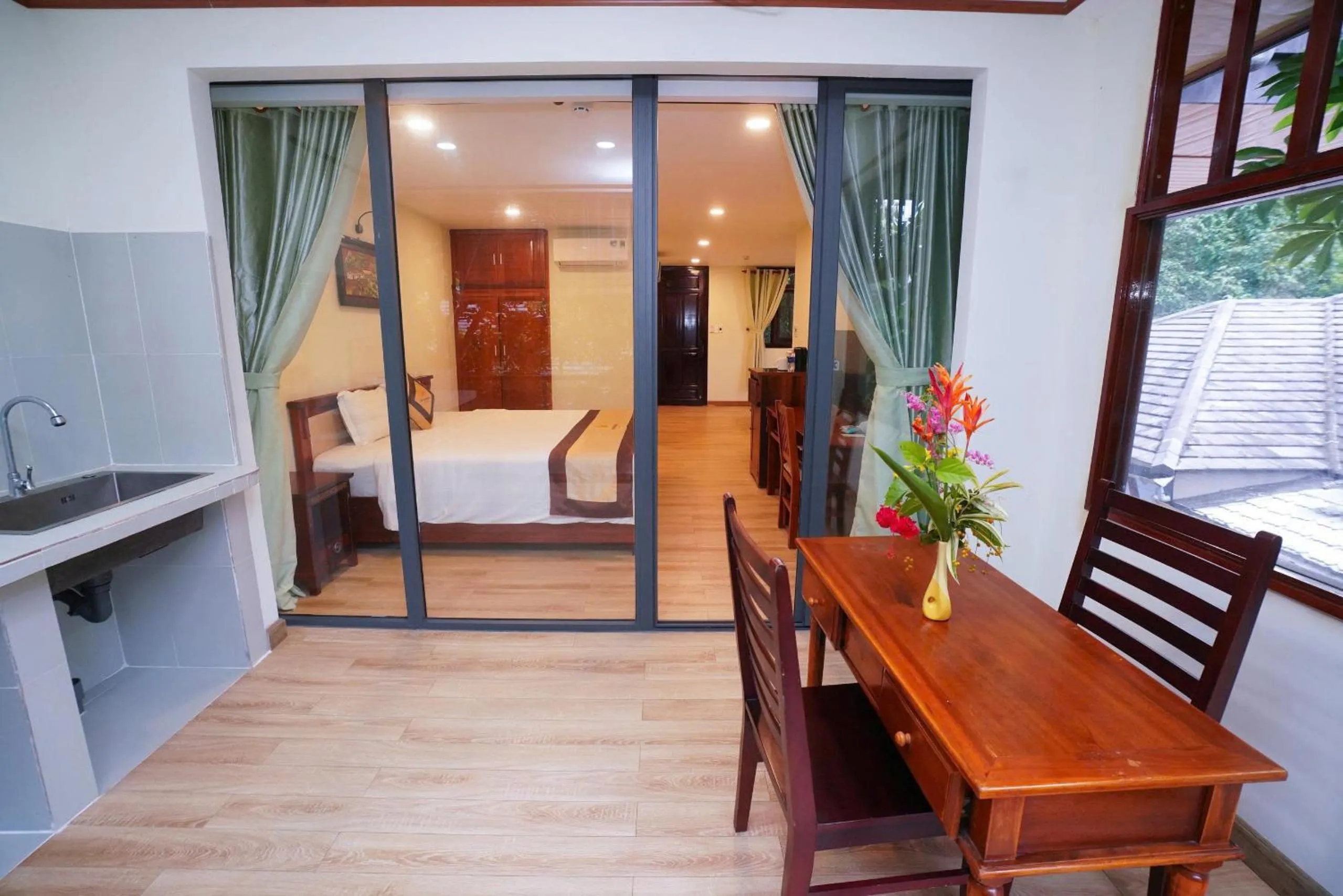 Seating area, Bed in Vela Phu Quoc Resort