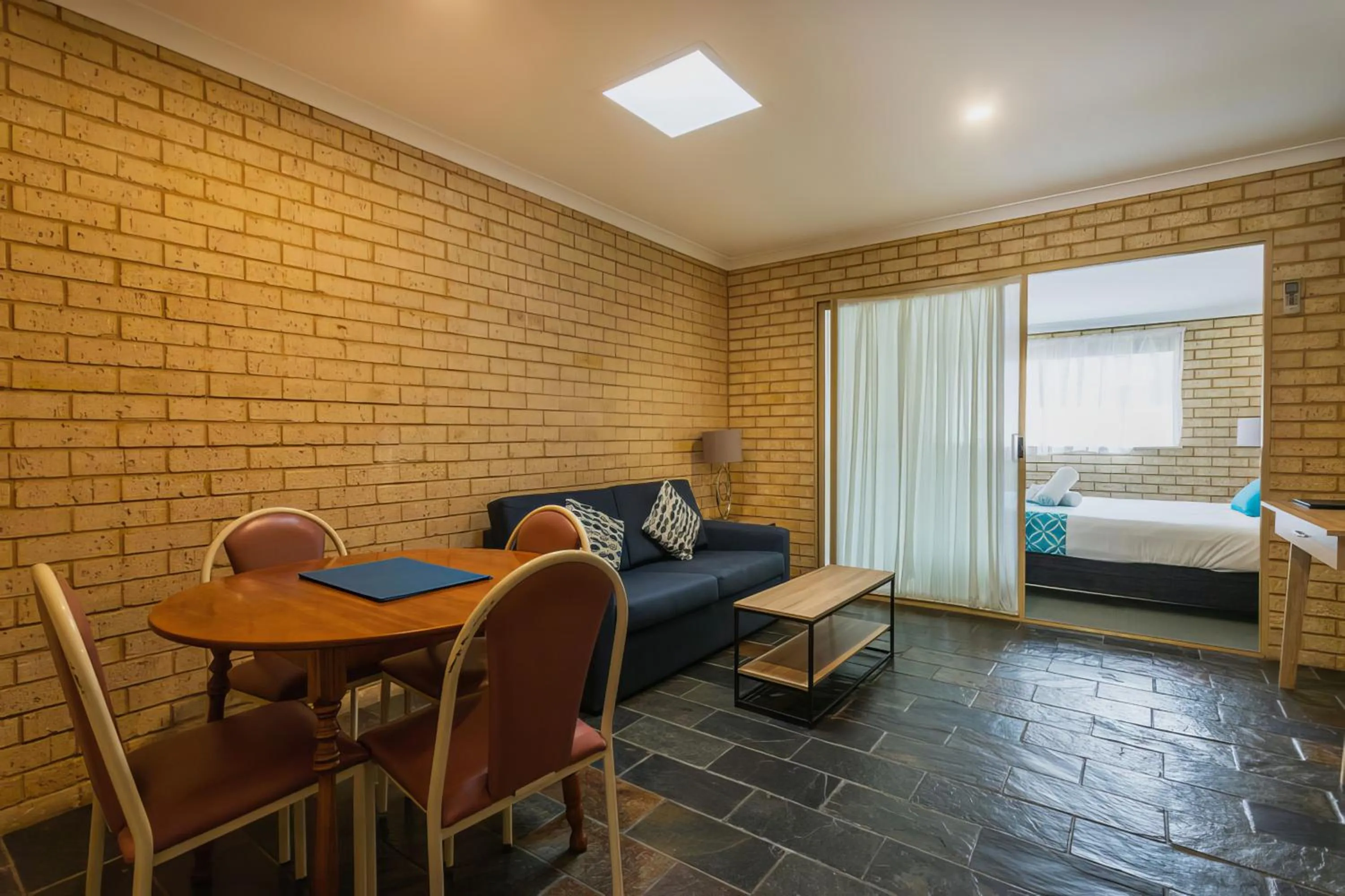 Living room, Bed in Busselton Villas and Glamping Village