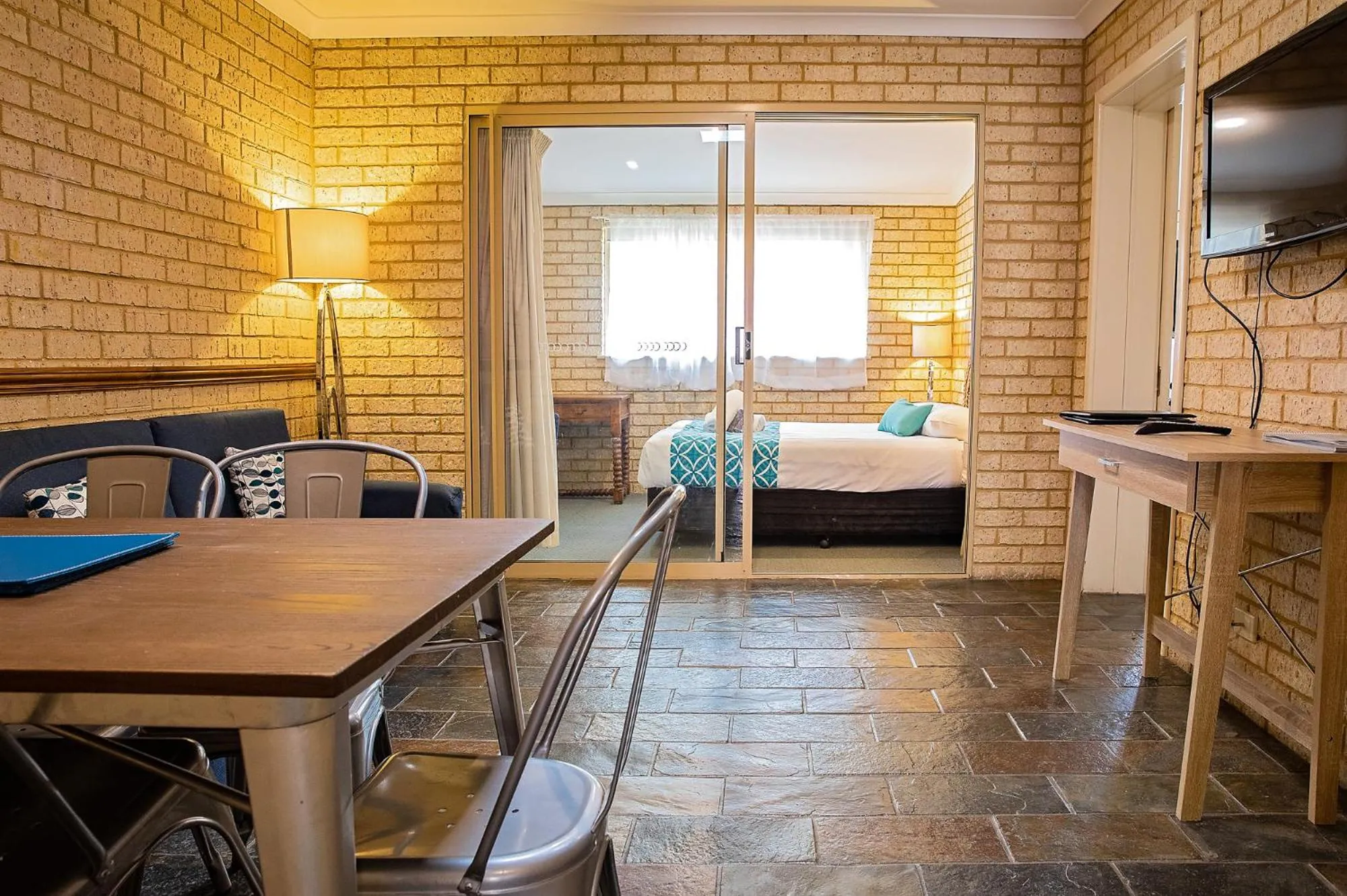 Living room, Bed in Busselton Villas and Glamping Village