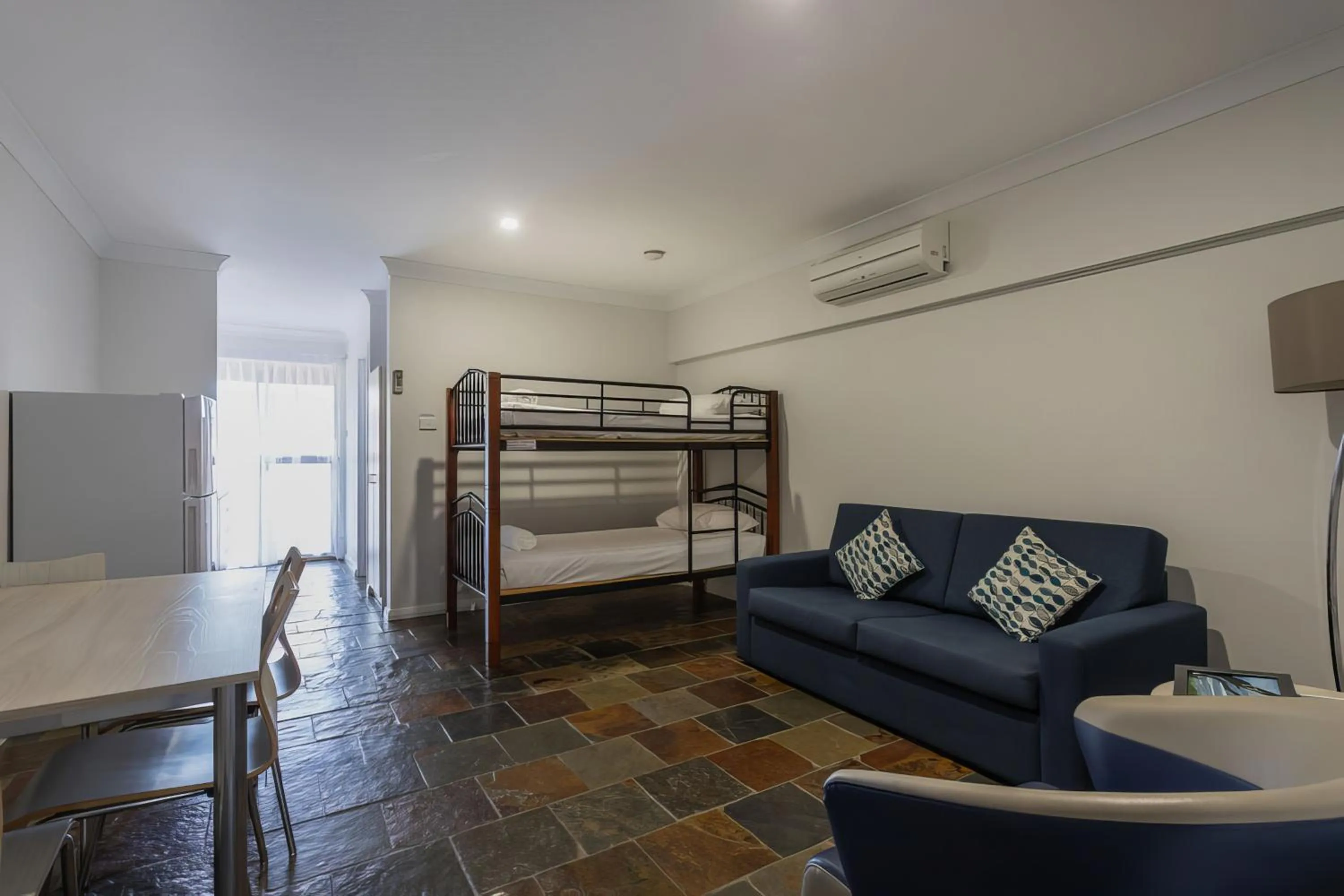 Living room, Bed in Busselton Villas and Glamping Village