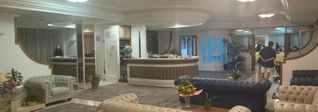 Living room in Mondial Park Hotel