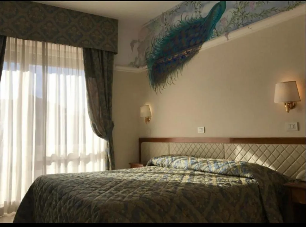 Bed in Mondial Park Hotel