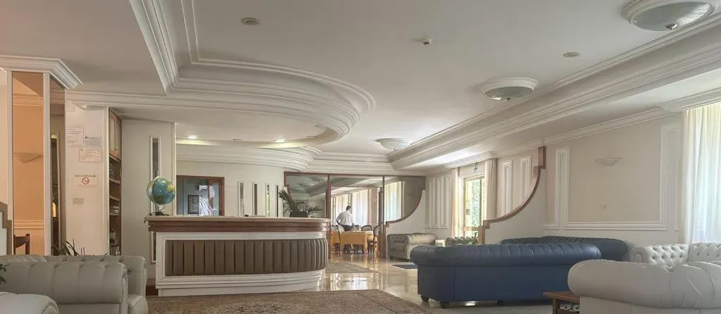 Living room in Mondial Park Hotel