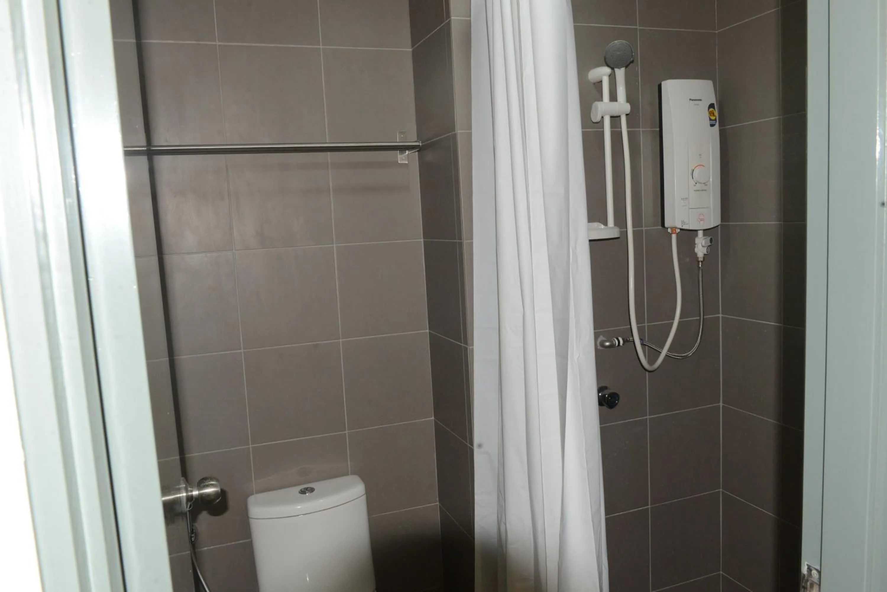 Toilet in Summer Suites Studios