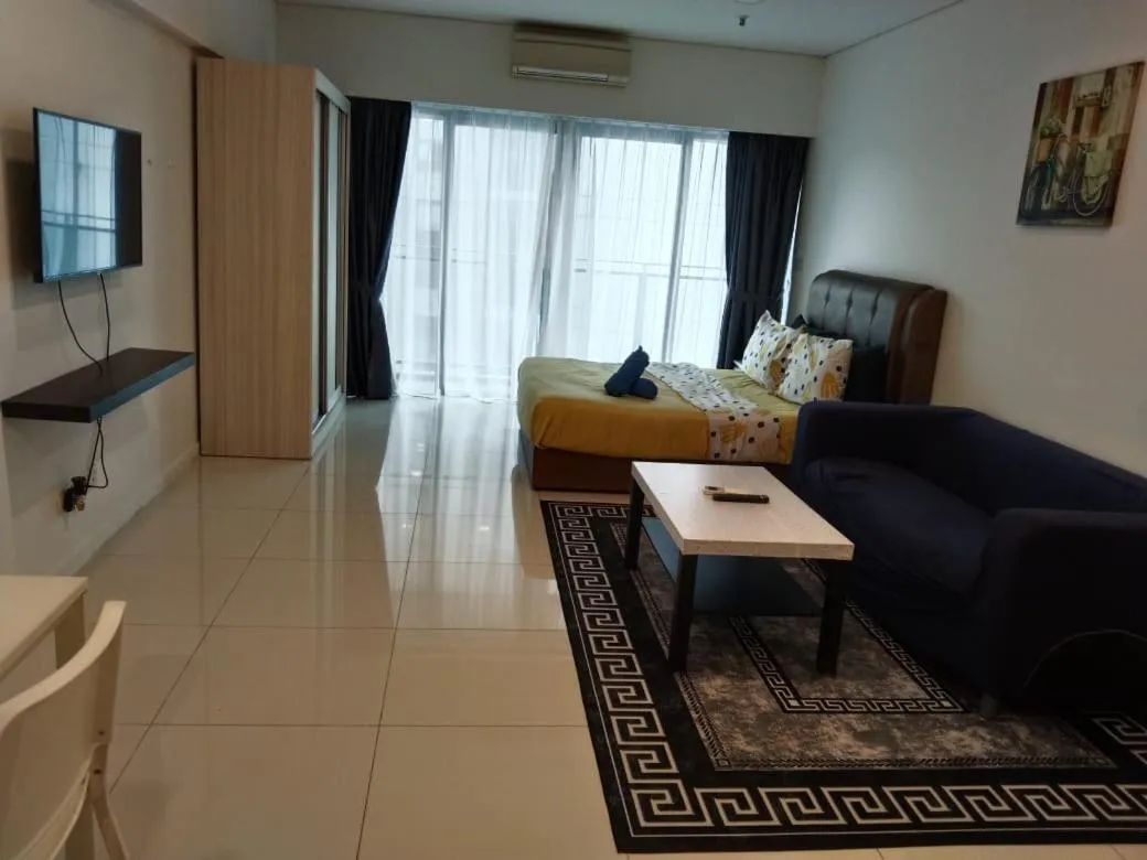 Bed in Summer Suites Studios