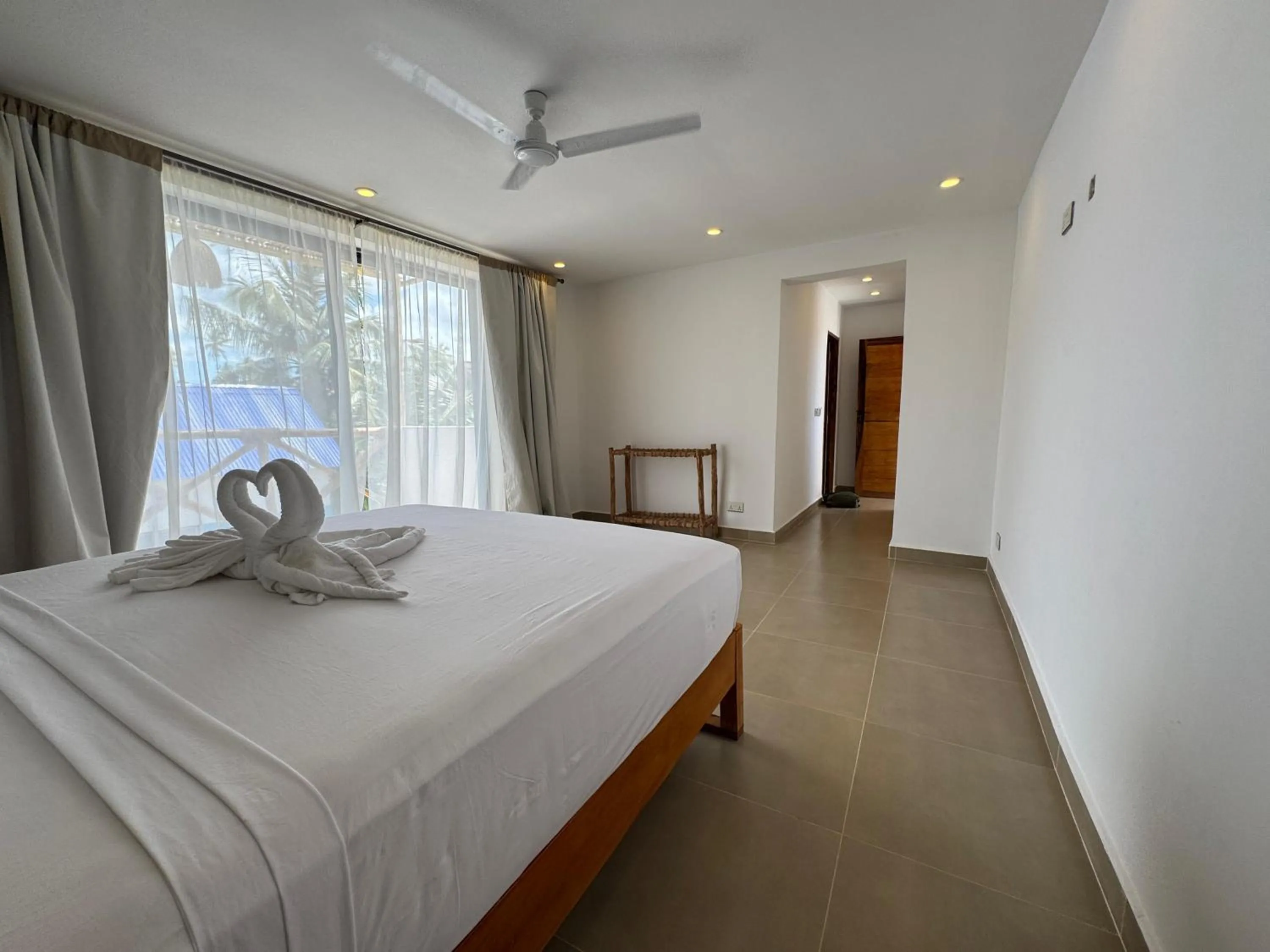 Queen Room with Balcony in Starfish Garden Lodge