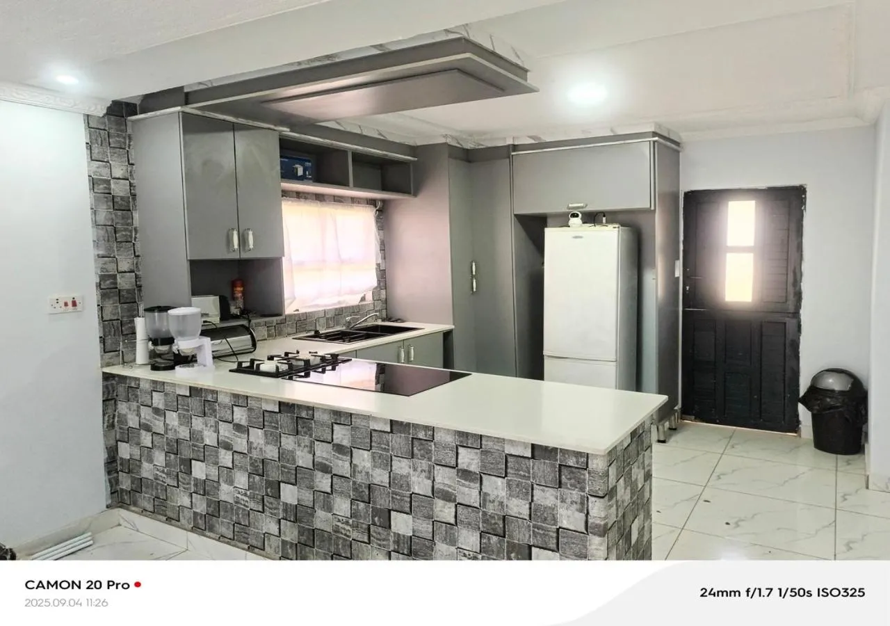 Kitchen or kitchenette in Raneziah Guesthouse