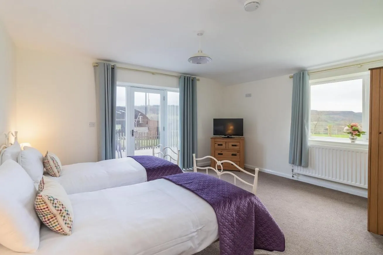 Bed in The Grainary Cottages