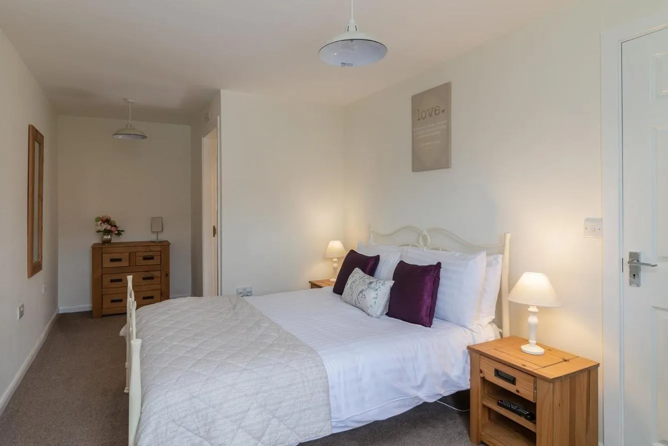 Bed in The Grainary Cottages