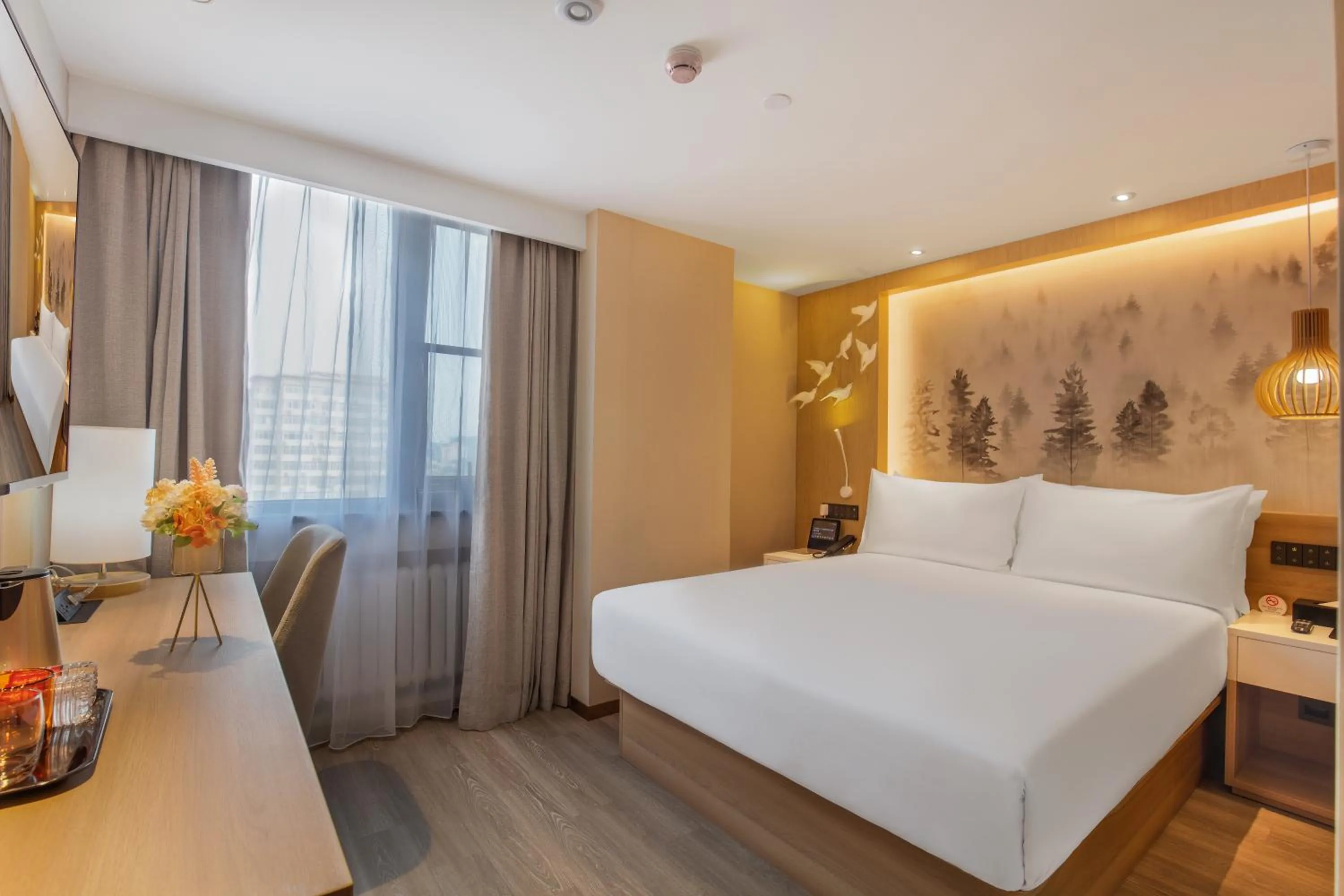 Bed in Orange Beijing Yansha Landmark Hotel