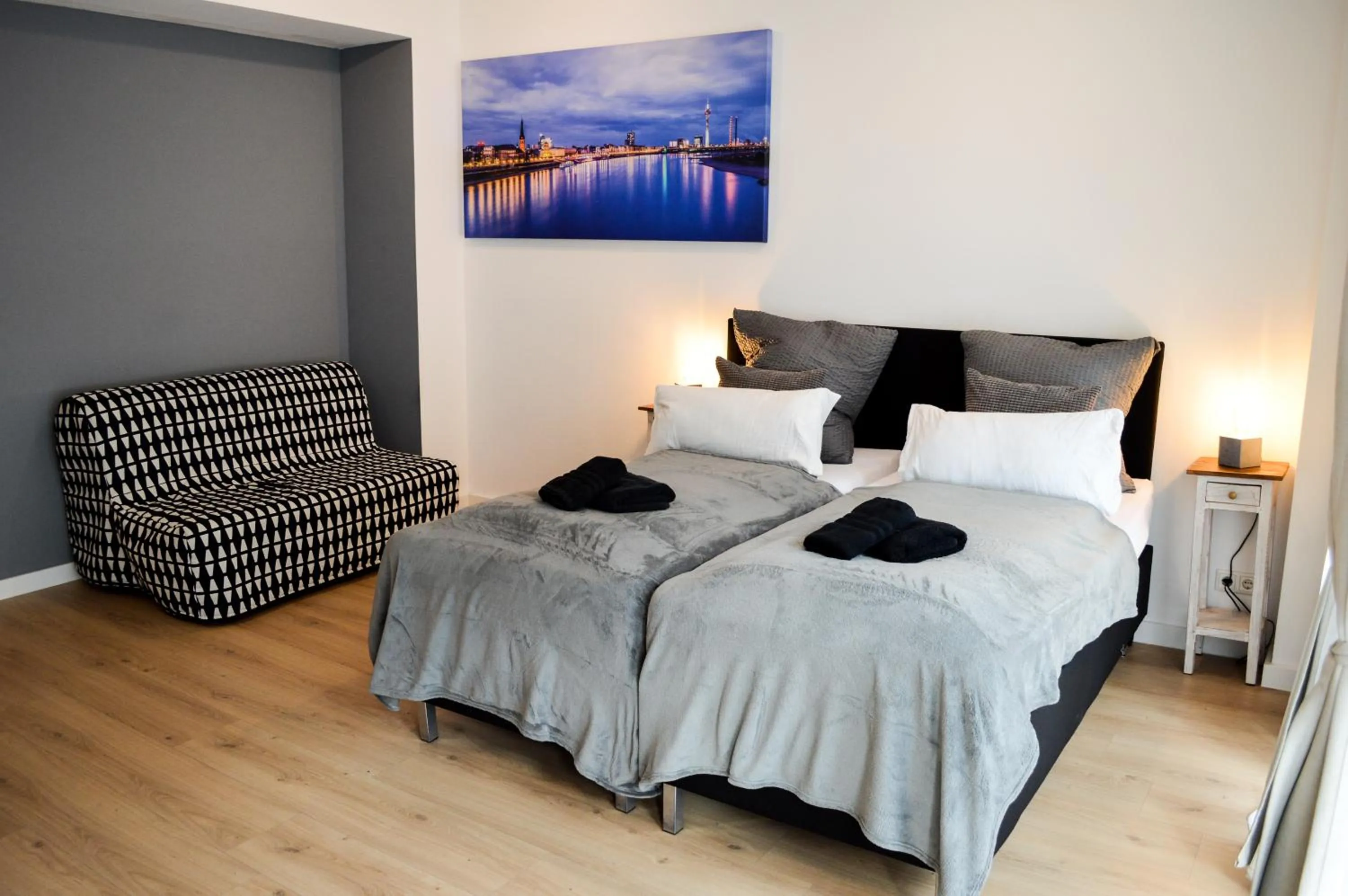 Seating area, Bed in Centerapartments Tonhallenstraße