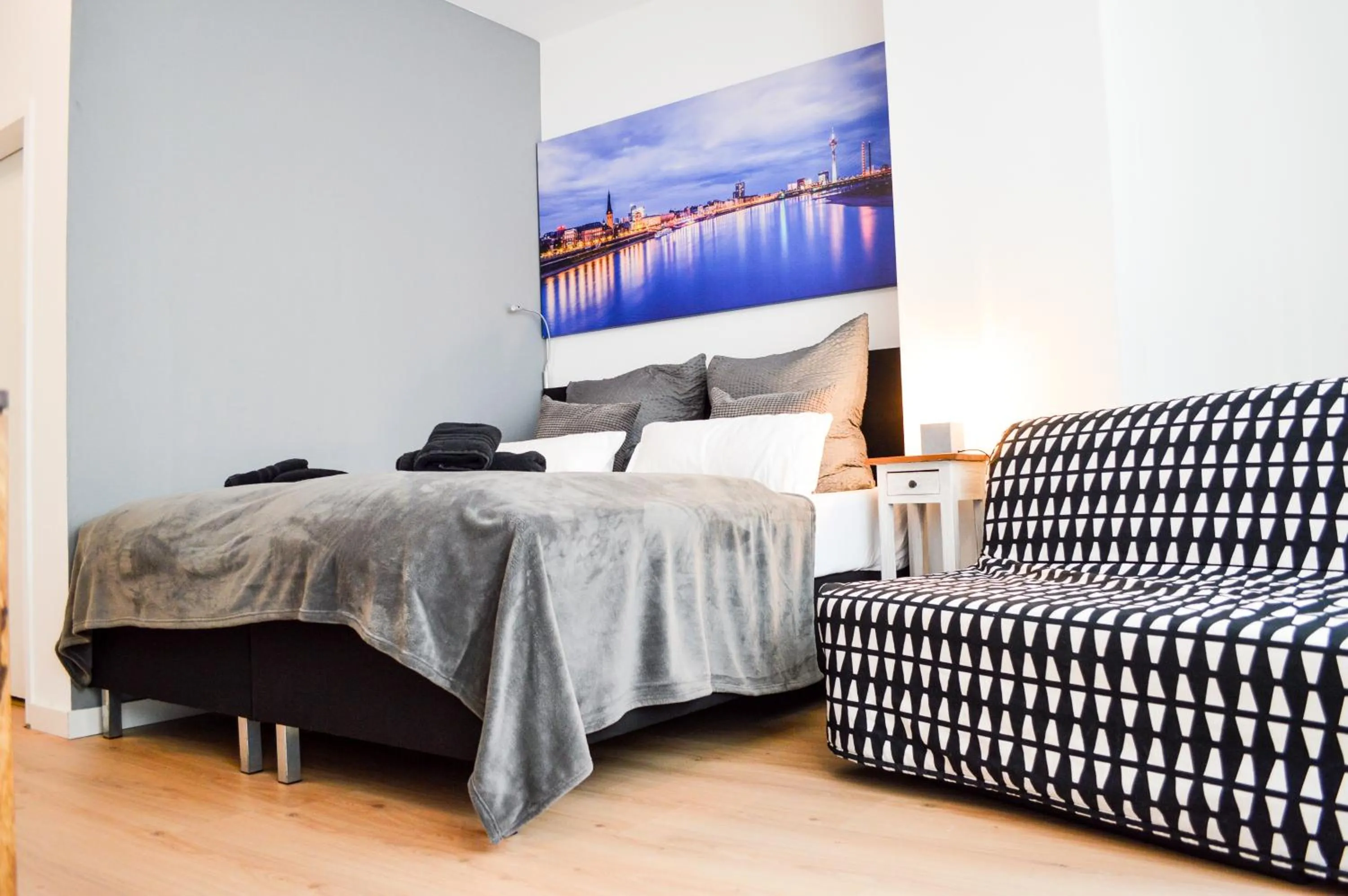 Seating area, Bed in Centerapartments Tonhallenstraße