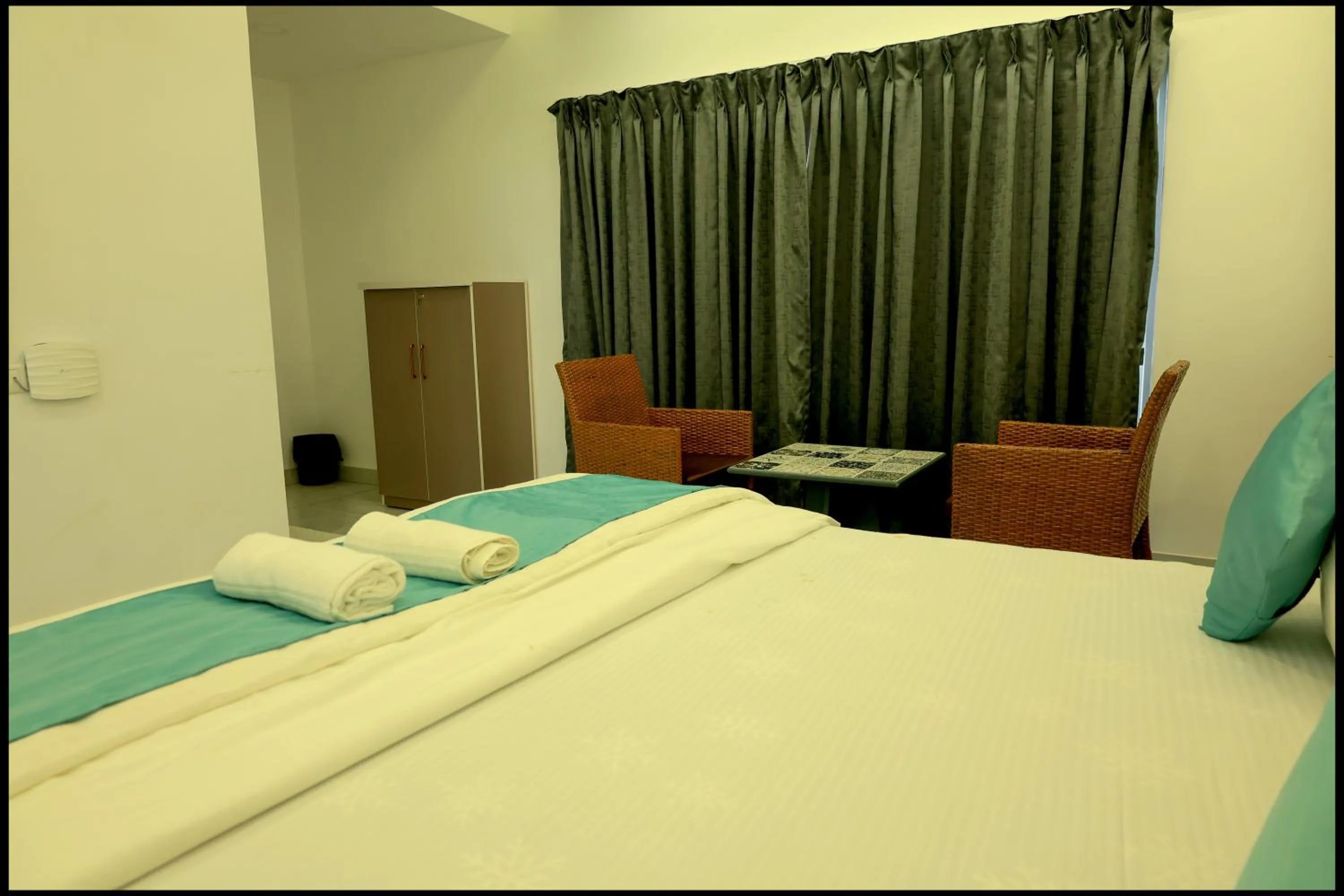 Bed in Prasanna Beach Resort