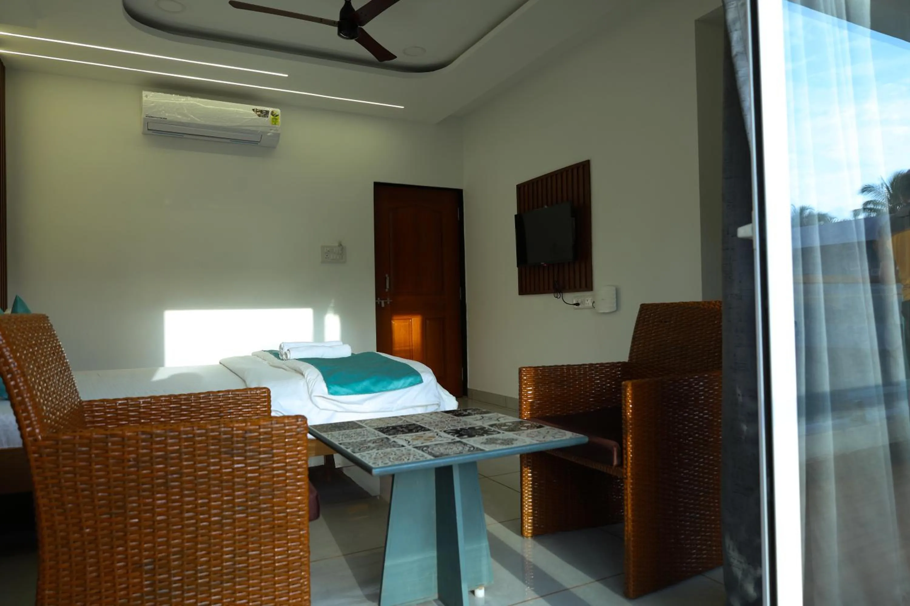 Bed in Prasanna Beach Resort