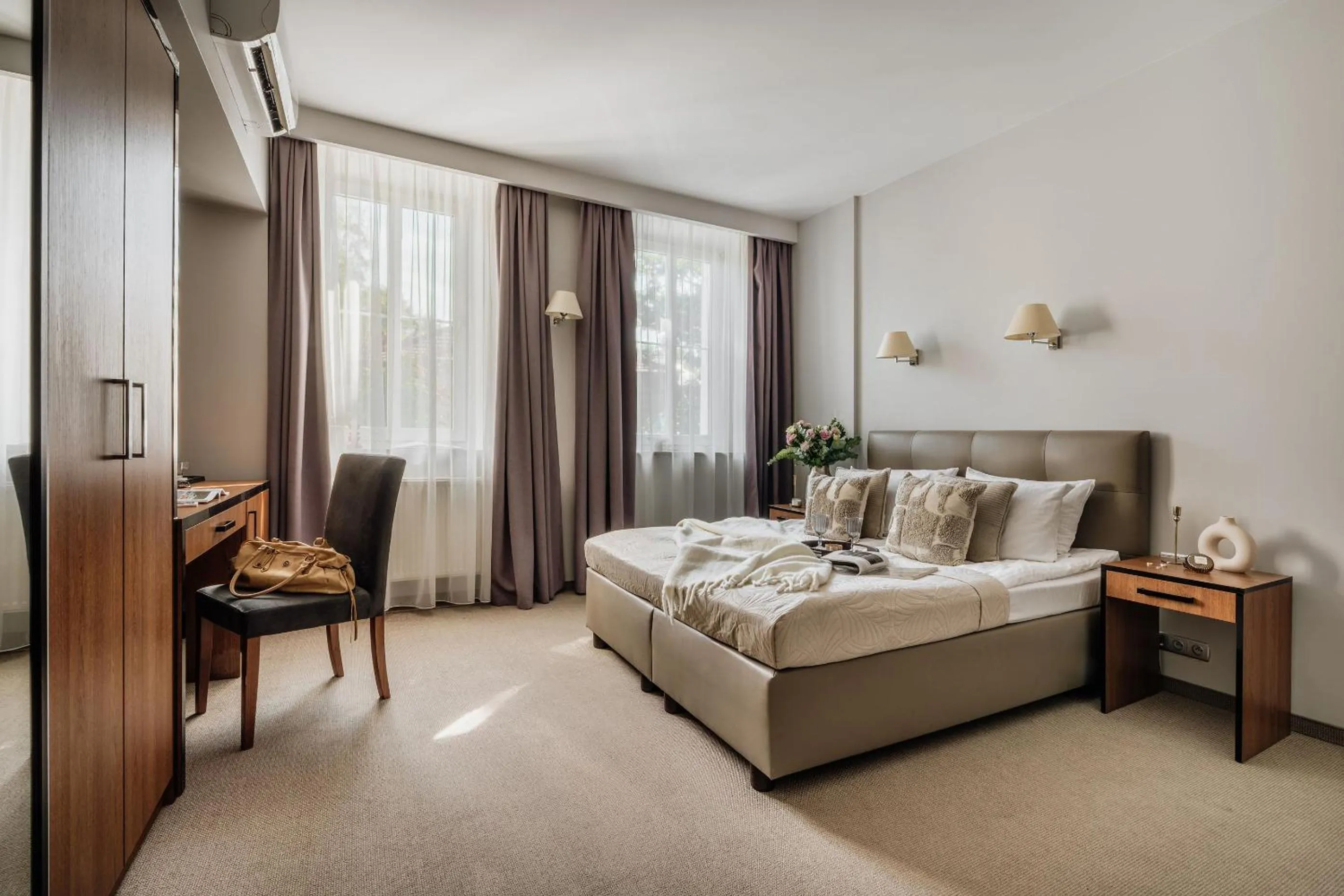 Bed in Grottger Luxury Boutique Hotel City