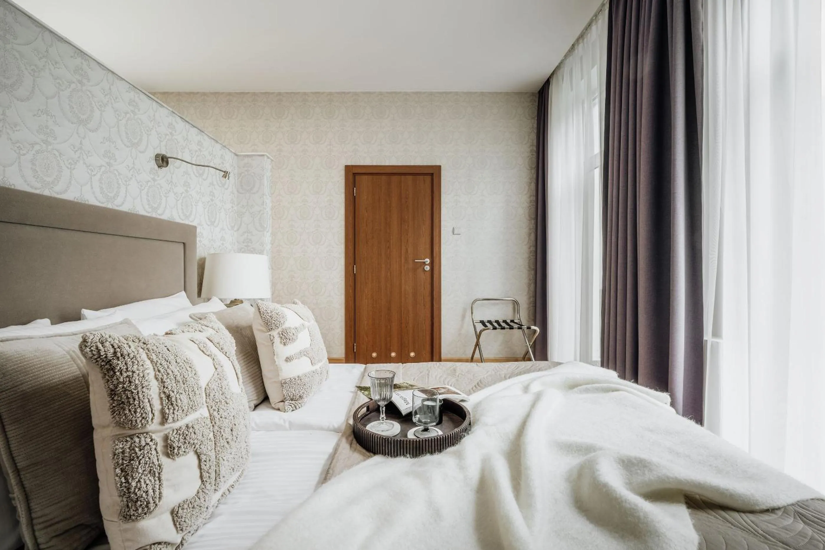 Bed in Grottger Luxury Boutique Hotel City