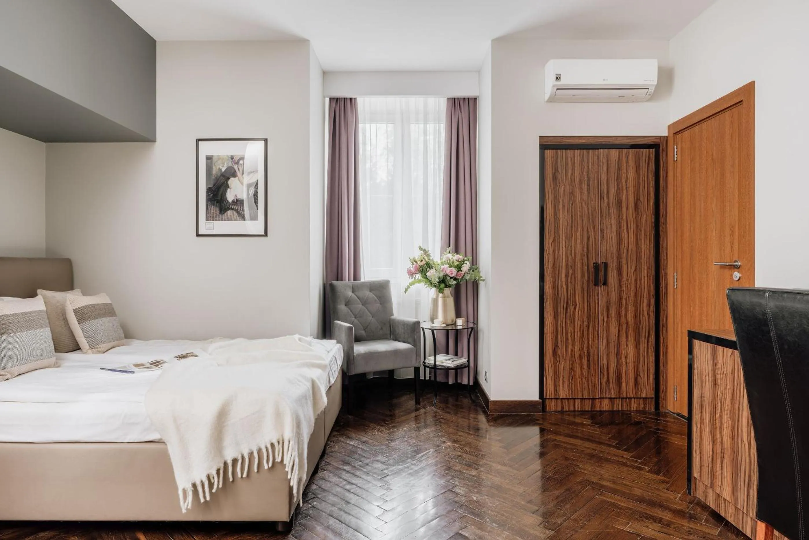 Bed in Grottger Luxury Boutique Hotel City