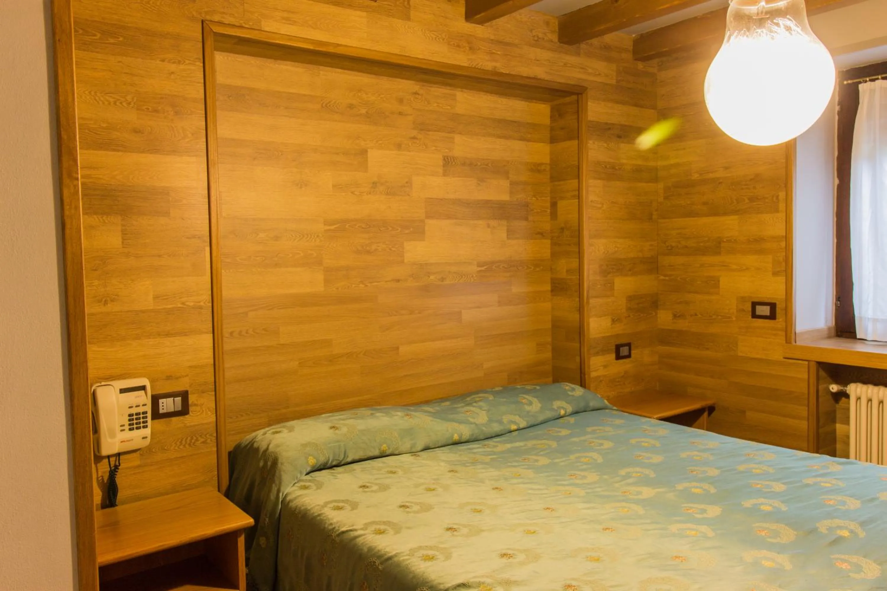 Bed in Albergo Speranza Asiago