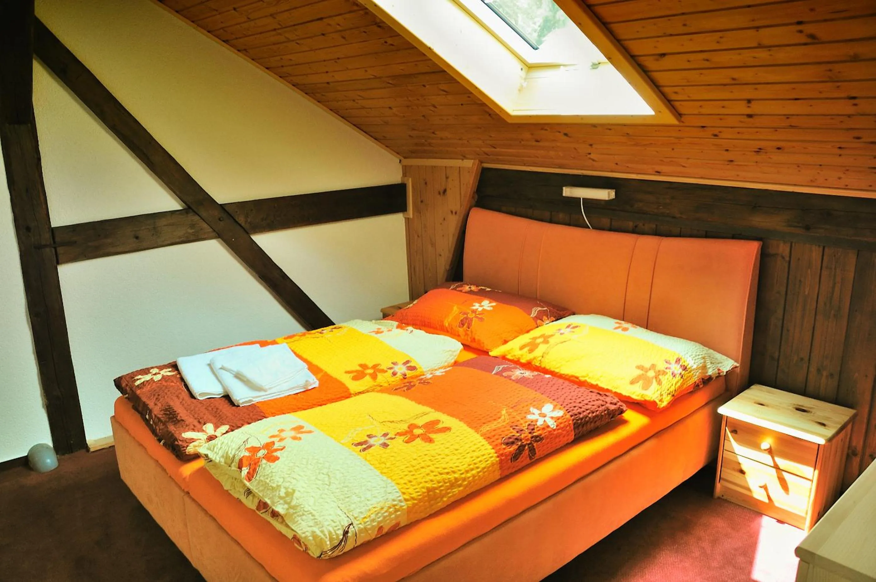 Living room, Bed in Penzion Kameňák