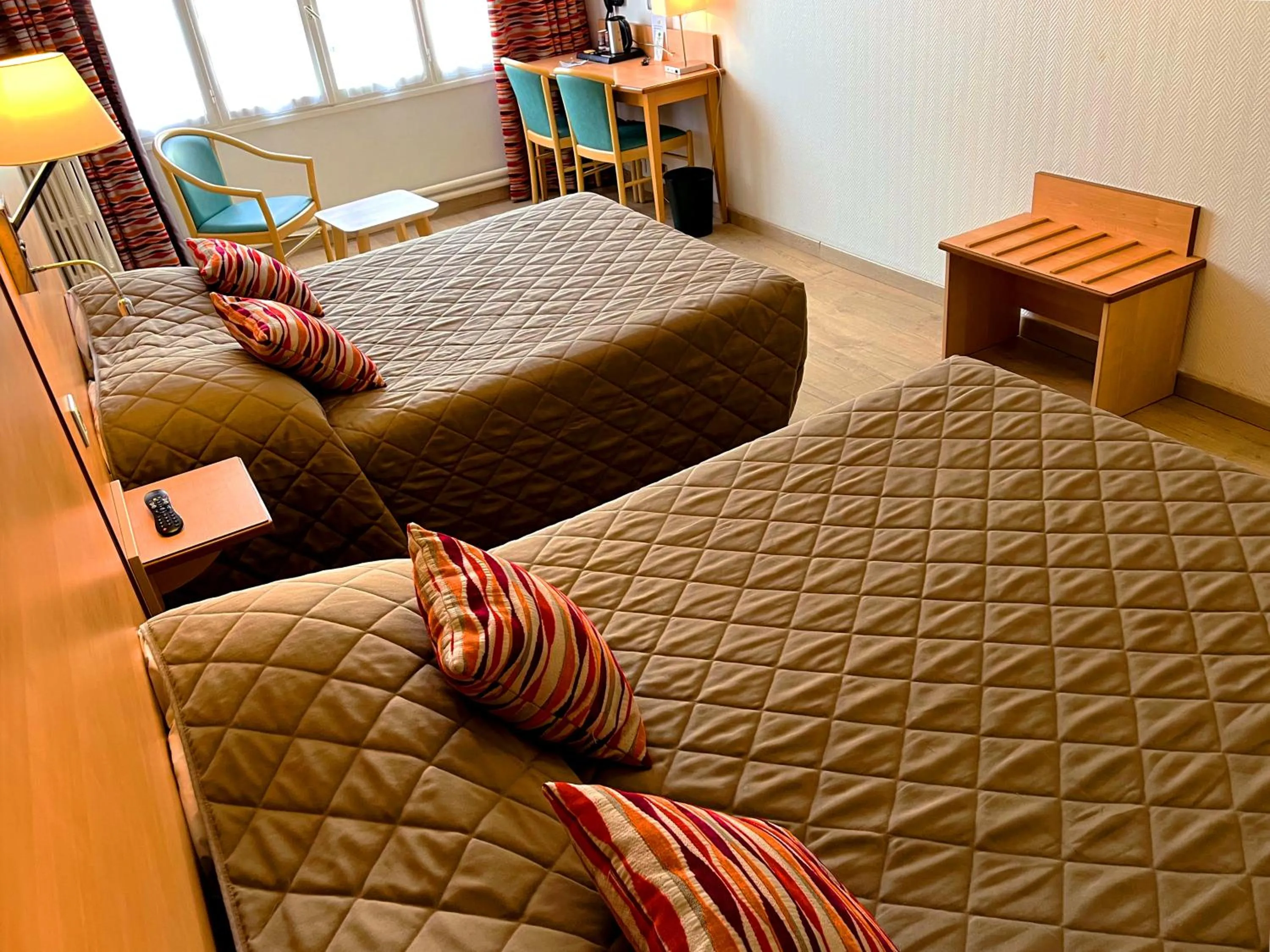 Photo of the whole room, Bed in Hôtel du Cheval Rouge